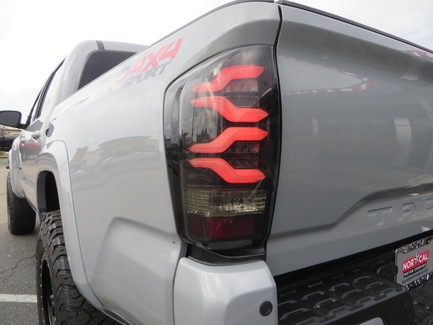 2019 grey /black Toyota Tacoma TRD Sport Double Cab (3TMCZ5AN2KM) with an 3.6L V6 DOHC 24V engine, 6A transmission, located at 2630 Grass Valley Highway, Auburn, CA, 95603, (530) 508-5100, 38.937893, -121.095482 - Must see Tacoma sitting on King 2.5 adjustable remote reservoir coilovers, King 2.5 adjustable remote reservoir rear shocks, Icon Upper control arms, BFG KO3 tires, 17" Method NV wheels, C4 front bumper, Baja Designs lights, LUXX series taillights, aluminum TRD skid plate, bedmat, bed extender, and - Photo#17