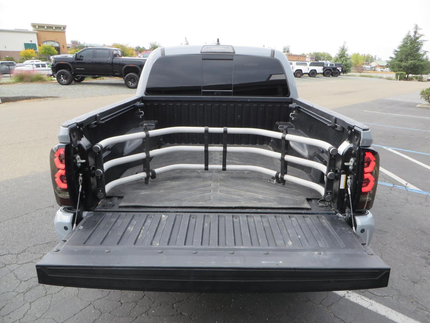 2019 grey /black Toyota Tacoma TRD Sport Double Cab (3TMCZ5AN2KM) with an 3.6L V6 DOHC 24V engine, 6A transmission, located at 2630 Grass Valley Highway, Auburn, CA, 95603, (530) 508-5100, 38.937893, -121.095482 - Must see Tacoma sitting on King 2.5 adjustable remote reservoir coilovers, King 2.5 adjustable remote reservoir rear shocks, Icon Upper control arms, BFG KO3 tires, 17" Method NV wheels, C4 front bumper, Baja Designs lights, LUXX series taillights, aluminum TRD skid plate, bedmat, bed extender, and - Photo#19