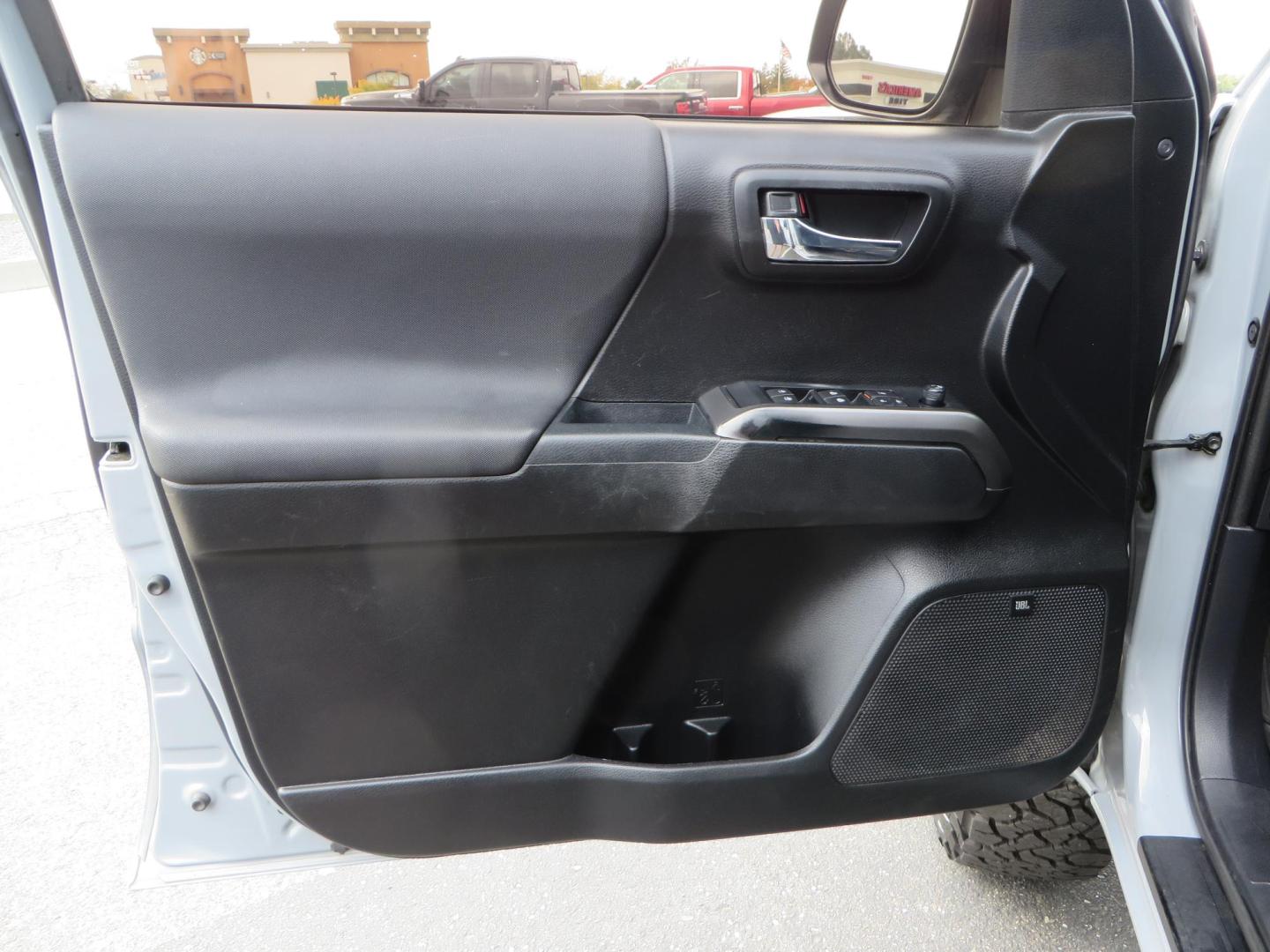 2019 grey /black Toyota Tacoma TRD Sport Double Cab (3TMCZ5AN2KM) with an 3.6L V6 DOHC 24V engine, 6A transmission, located at 2630 Grass Valley Highway, Auburn, CA, 95603, (530) 508-5100, 38.937893, -121.095482 - Must see Tacoma sitting on King 2.5 adjustable remote reservoir coilovers, King 2.5 adjustable remote reservoir rear shocks, Icon Upper control arms, BFG KO3 tires, 17" Method NV wheels, C4 front bumper, Baja Designs lights, LUXX series taillights, aluminum TRD skid plate, bedmat, bed extender, and - Photo#25