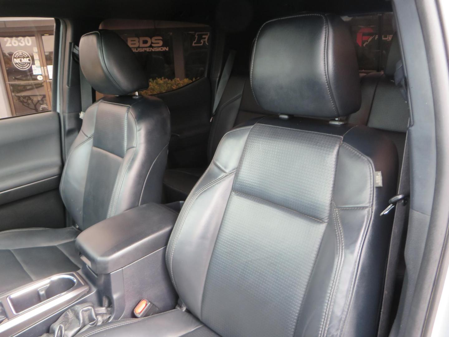 2019 grey /black Toyota Tacoma TRD Sport Double Cab (3TMCZ5AN2KM) with an 3.6L V6 DOHC 24V engine, 6A transmission, located at 2630 Grass Valley Highway, Auburn, CA, 95603, (530) 508-5100, 38.937893, -121.095482 - Must see Tacoma sitting on King 2.5 adjustable remote reservoir coilovers, King 2.5 adjustable remote reservoir rear shocks, Icon Upper control arms, BFG KO3 tires, 17" Method NV wheels, C4 front bumper, Baja Designs lights, LUXX series taillights, aluminum TRD skid plate, bedmat, bed extender, and - Photo#29