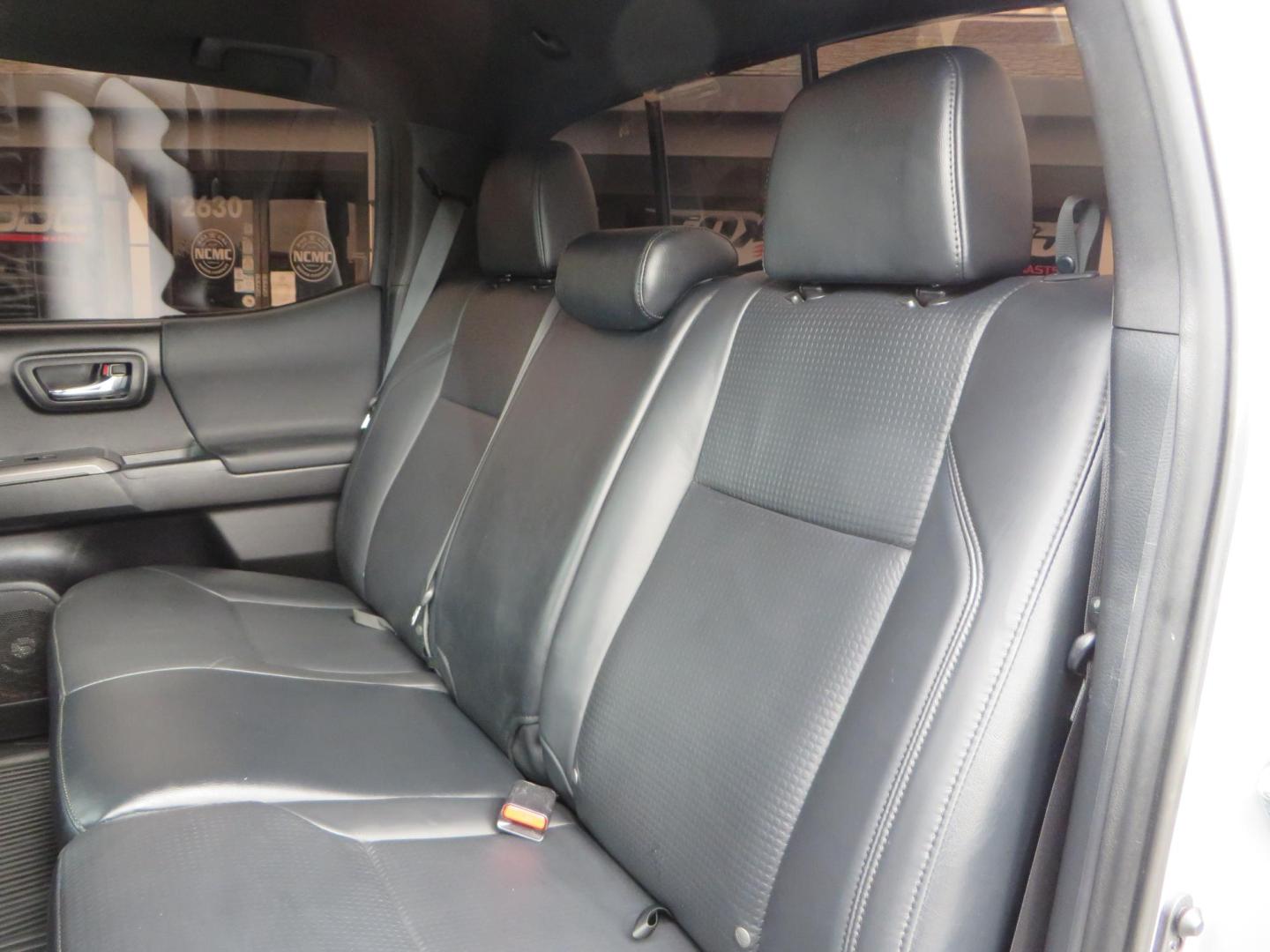 2019 grey /black Toyota Tacoma TRD Sport Double Cab (3TMCZ5AN2KM) with an 3.6L V6 DOHC 24V engine, 6A transmission, located at 2630 Grass Valley Highway, Auburn, CA, 95603, (530) 508-5100, 38.937893, -121.095482 - Must see Tacoma sitting on King 2.5 adjustable remote reservoir coilovers, King 2.5 adjustable remote reservoir rear shocks, Icon Upper control arms, BFG KO3 tires, 17" Method NV wheels, C4 front bumper, Baja Designs lights, LUXX series taillights, aluminum TRD skid plate, bedmat, bed extender, and - Photo#50