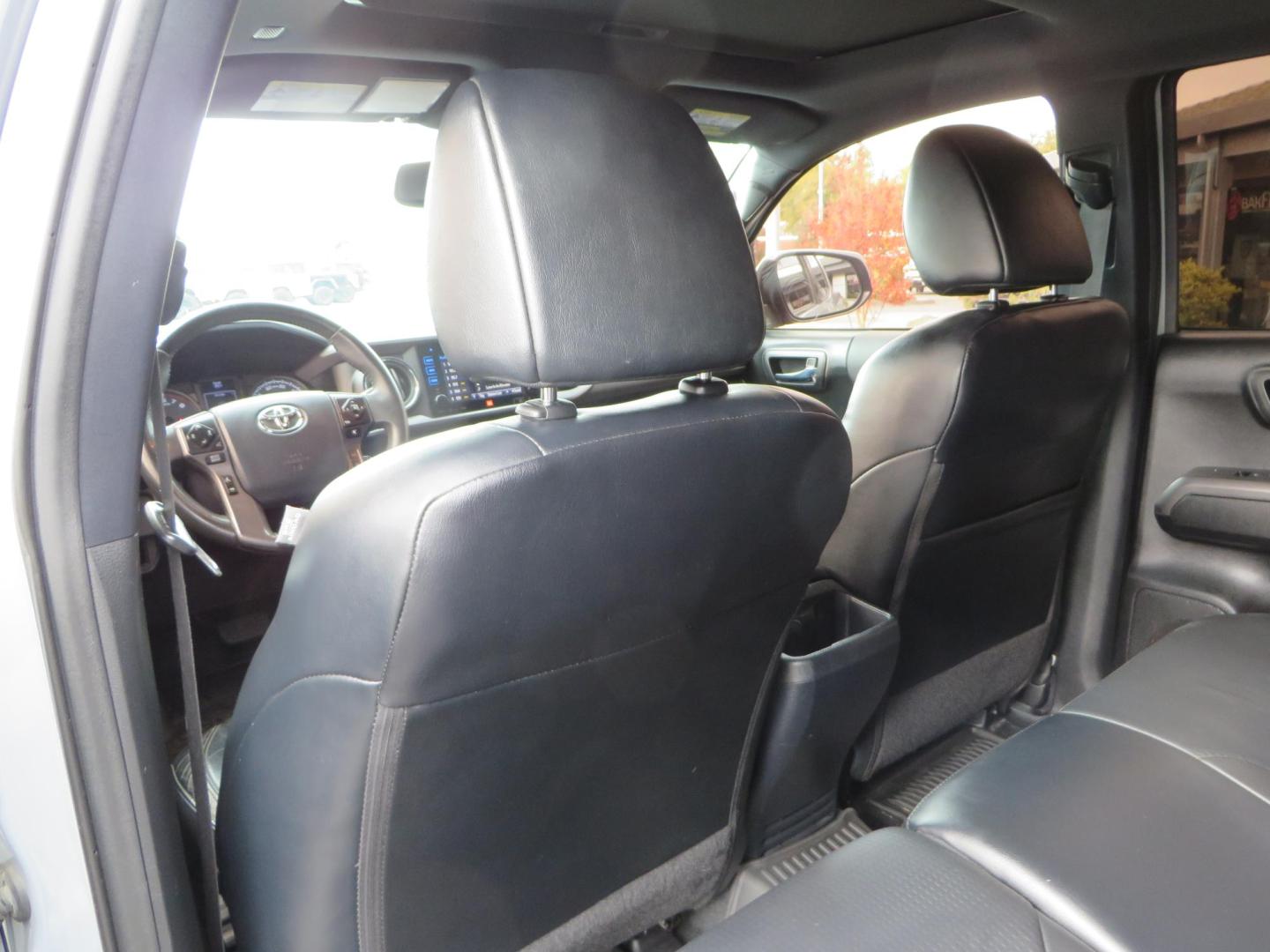 2019 grey /black Toyota Tacoma TRD Sport Double Cab (3TMCZ5AN2KM) with an 3.6L V6 DOHC 24V engine, 6A transmission, located at 2630 Grass Valley Highway, Auburn, CA, 95603, (530) 508-5100, 38.937893, -121.095482 - Must see Tacoma sitting on King 2.5 adjustable remote reservoir coilovers, King 2.5 adjustable remote reservoir rear shocks, Icon Upper control arms, BFG KO3 tires, 17" Method NV wheels, C4 front bumper, Baja Designs lights, LUXX series taillights, aluminum TRD skid plate, bedmat, bed extender, and - Photo#52