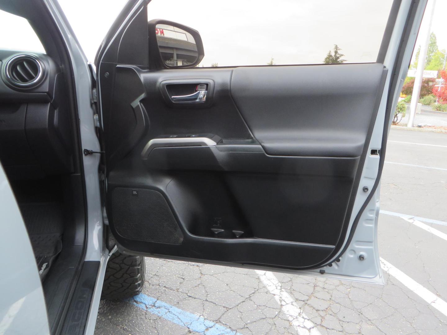 2019 grey /black Toyota Tacoma TRD Sport Double Cab (3TMCZ5AN2KM) with an 3.6L V6 DOHC 24V engine, 6A transmission, located at 2630 Grass Valley Highway, Auburn, CA, 95603, (530) 508-5100, 38.937893, -121.095482 - Must see Tacoma sitting on King 2.5 adjustable remote reservoir coilovers, King 2.5 adjustable remote reservoir rear shocks, Icon Upper control arms, BFG KO3 tires, 17" Method NV wheels, C4 front bumper, Baja Designs lights, LUXX series taillights, aluminum TRD skid plate, bedmat, bed extender, and - Photo#54