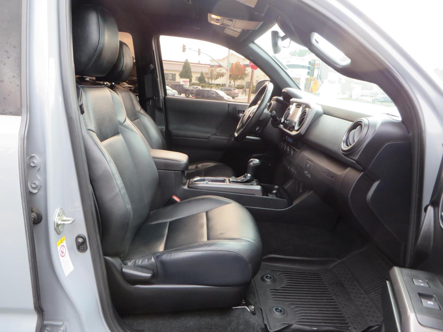 2019 grey /black Toyota Tacoma TRD Sport Double Cab (3TMCZ5AN2KM) with an 3.6L V6 DOHC 24V engine, 6A transmission, located at 2630 Grass Valley Highway, Auburn, CA, 95603, (530) 508-5100, 38.937893, -121.095482 - Must see Tacoma sitting on King 2.5 adjustable remote reservoir coilovers, King 2.5 adjustable remote reservoir rear shocks, Icon Upper control arms, BFG KO3 tires, 17" Method NV wheels, C4 front bumper, Baja Designs lights, LUXX series taillights, aluminum TRD skid plate, bedmat, bed extender, and - Photo#56