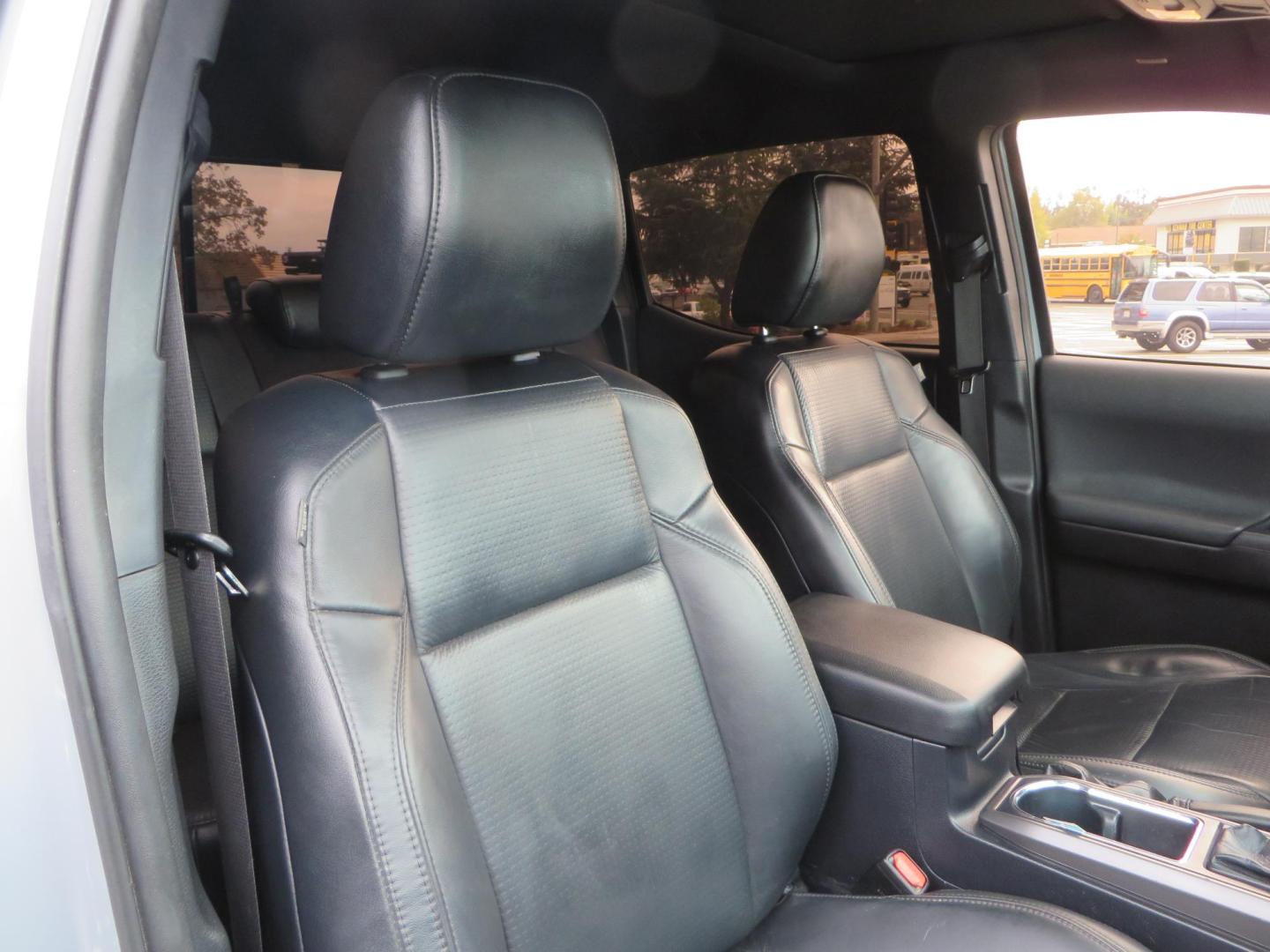 2019 grey /black Toyota Tacoma TRD Sport Double Cab (3TMCZ5AN2KM) with an 3.6L V6 DOHC 24V engine, 6A transmission, located at 2630 Grass Valley Highway, Auburn, CA, 95603, (530) 508-5100, 38.937893, -121.095482 - Must see Tacoma sitting on King 2.5 adjustable remote reservoir coilovers, King 2.5 adjustable remote reservoir rear shocks, Icon Upper control arms, BFG KO3 tires, 17" Method NV wheels, C4 front bumper, Baja Designs lights, LUXX series taillights, aluminum TRD skid plate, bedmat, bed extender, and - Photo#57