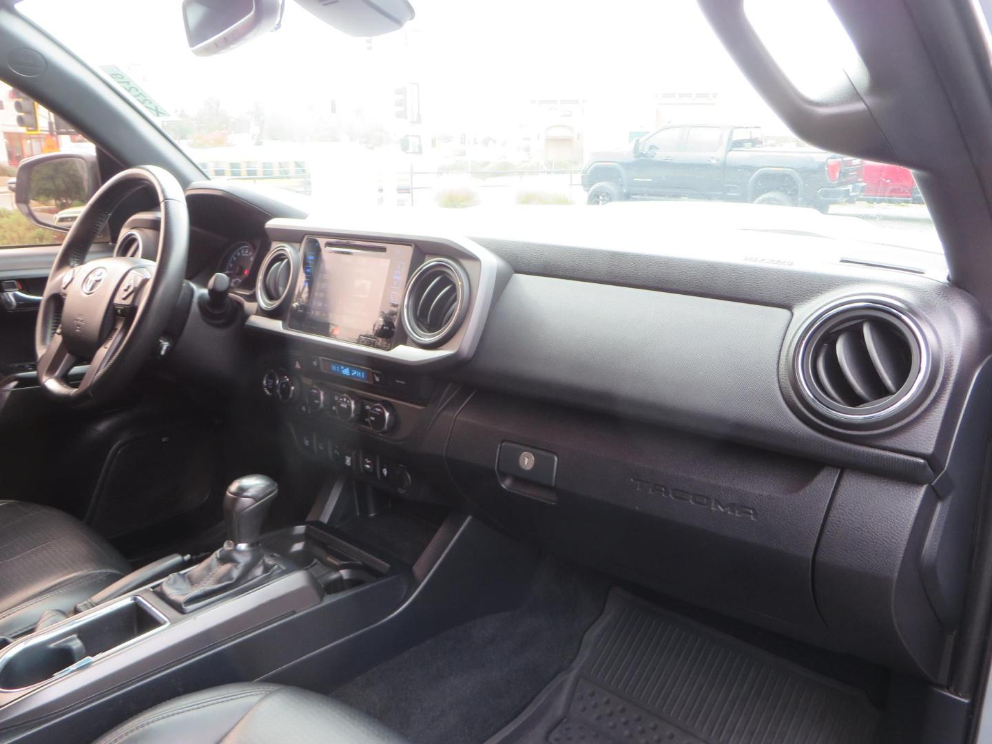 2019 grey /black Toyota Tacoma TRD Sport Double Cab (3TMCZ5AN2KM) with an 3.6L V6 DOHC 24V engine, 6A transmission, located at 2630 Grass Valley Highway, Auburn, CA, 95603, (530) 508-5100, 38.937893, -121.095482 - Must see Tacoma sitting on King 2.5 adjustable remote reservoir coilovers, King 2.5 adjustable remote reservoir rear shocks, Icon Upper control arms, BFG KO3 tires, 17" Method NV wheels, C4 front bumper, Baja Designs lights, LUXX series taillights, aluminum TRD skid plate, bedmat, bed extender, and - Photo#59