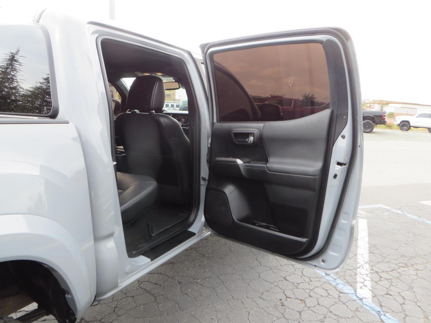 2019 grey /black Toyota Tacoma TRD Sport Double Cab (3TMCZ5AN2KM) with an 3.6L V6 DOHC 24V engine, 6A transmission, located at 2630 Grass Valley Highway, Auburn, CA, 95603, (530) 508-5100, 38.937893, -121.095482 - Must see Tacoma sitting on King 2.5 adjustable remote reservoir coilovers, King 2.5 adjustable remote reservoir rear shocks, Icon Upper control arms, BFG KO3 tires, 17" Method NV wheels, C4 front bumper, Baja Designs lights, LUXX series taillights, aluminum TRD skid plate, bedmat, bed extender, and - Photo#60