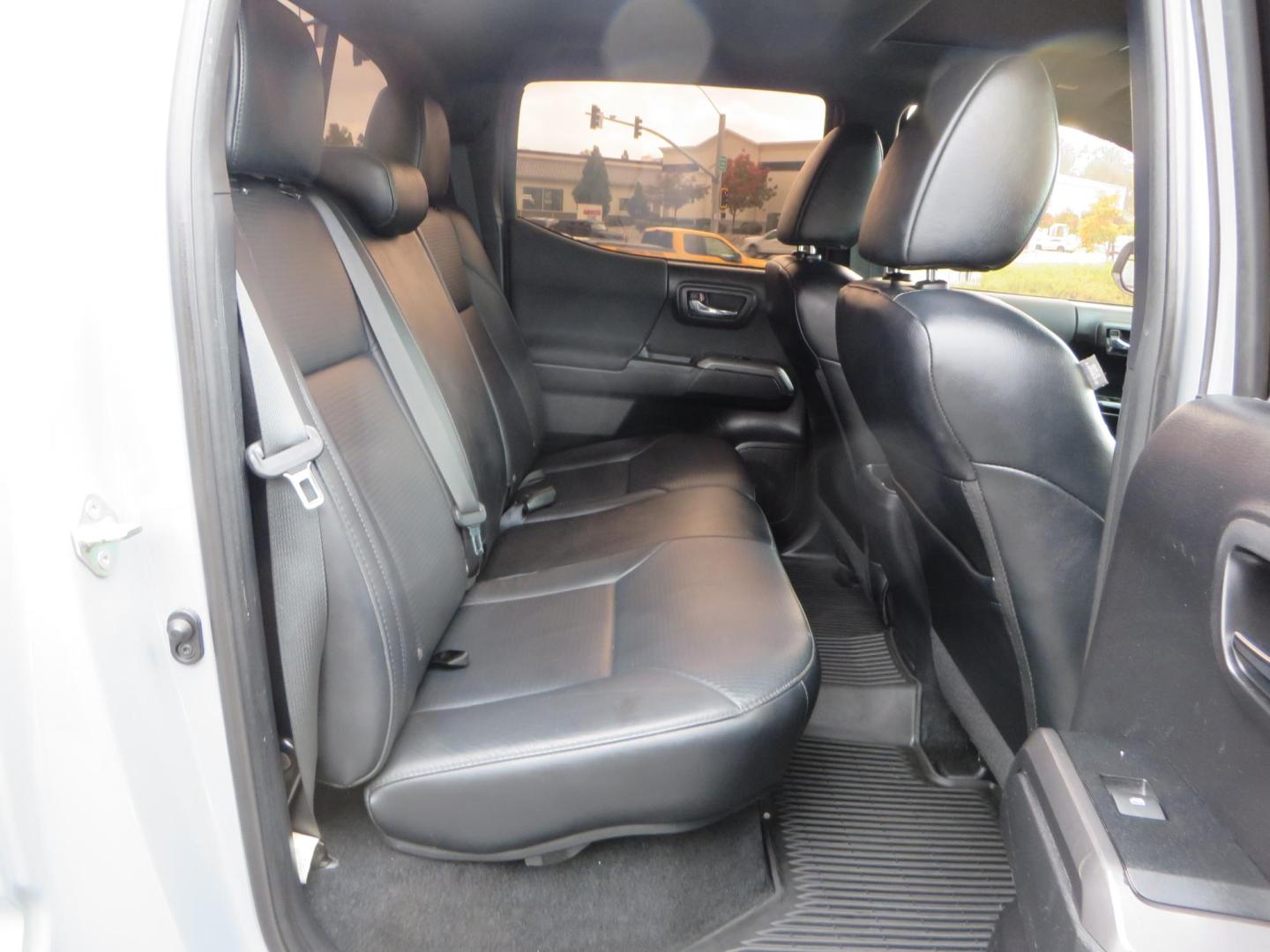 2019 grey /black Toyota Tacoma TRD Sport Double Cab (3TMCZ5AN2KM) with an 3.6L V6 DOHC 24V engine, 6A transmission, located at 2630 Grass Valley Highway, Auburn, CA, 95603, (530) 508-5100, 38.937893, -121.095482 - Must see Tacoma sitting on King 2.5 adjustable remote reservoir coilovers, King 2.5 adjustable remote reservoir rear shocks, Icon Upper control arms, BFG KO3 tires, 17" Method NV wheels, C4 front bumper, Baja Designs lights, LUXX series taillights, aluminum TRD skid plate, bedmat, bed extender, and - Photo#63