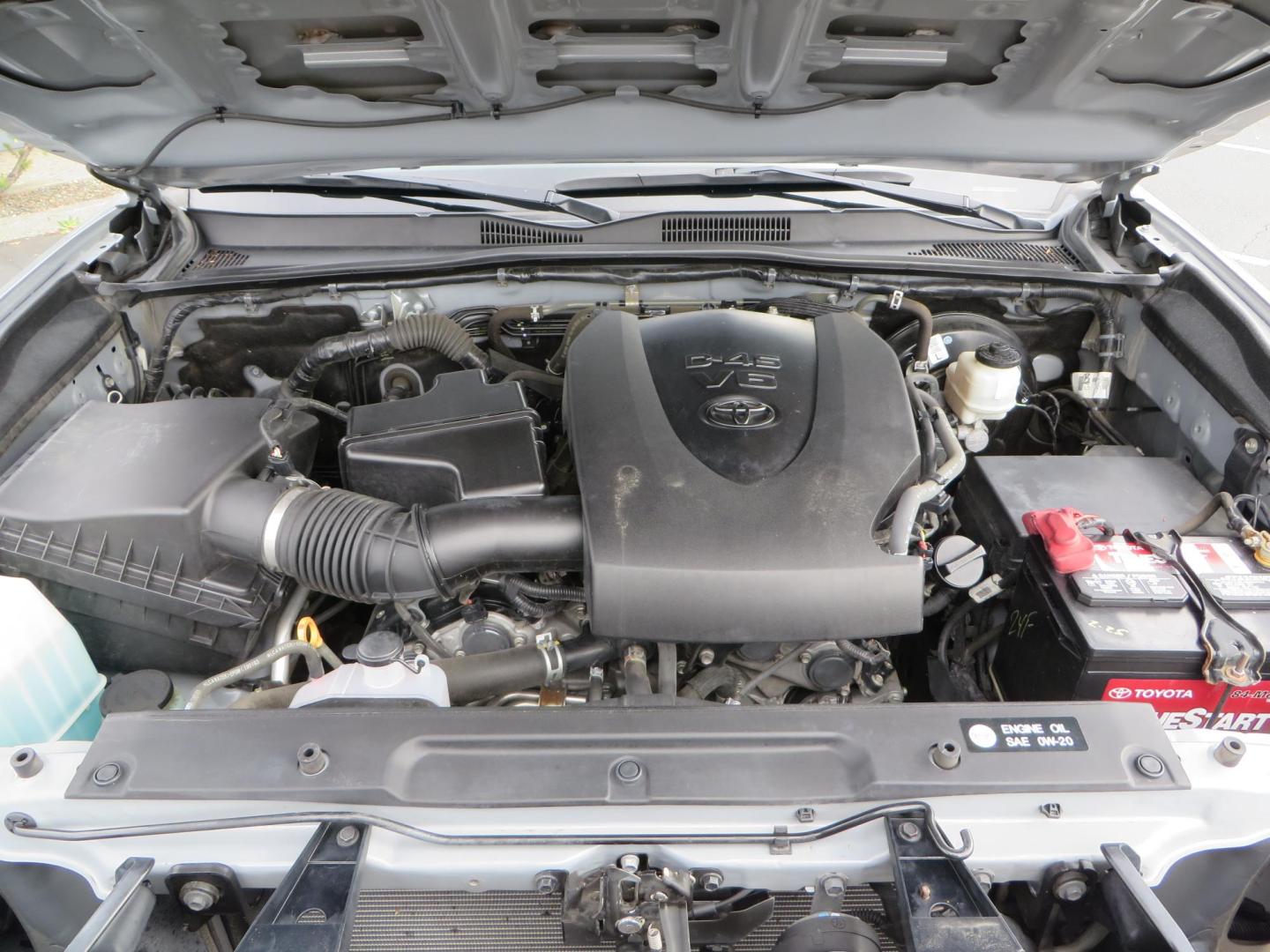 2019 grey /black Toyota Tacoma TRD Sport Double Cab (3TMCZ5AN2KM) with an 3.6L V6 DOHC 24V engine, 6A transmission, located at 2630 Grass Valley Highway, Auburn, CA, 95603, (530) 508-5100, 38.937893, -121.095482 - Must see Tacoma sitting on King 2.5 adjustable remote reservoir coilovers, King 2.5 adjustable remote reservoir rear shocks, Icon Upper control arms, BFG KO3 tires, 17" Method NV wheels, C4 front bumper, Baja Designs lights, LUXX series taillights, aluminum TRD skid plate, bedmat, bed extender, and - Photo#67