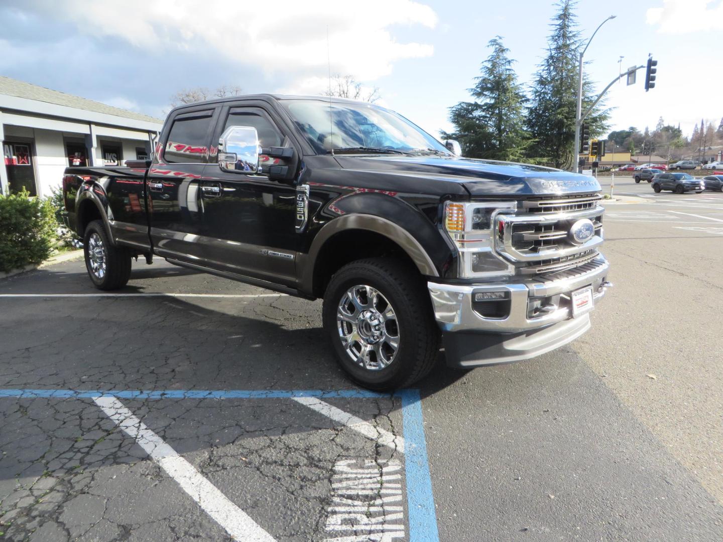 2020 BLACK /BROWN Ford F-350 SD King Ranch Crew Cab Long Bed 4WD (1FT8W3BT7LE) with an 6.7L V8 OHV 16V DIESEL engine, 6A transmission, located at 2630 Grass Valley Highway, Auburn, CA, 95603, (530) 508-5100, 38.937893, -121.095482 - Features a Decked Truck Bed storage system, Better Build toolbox, Bolt cable locks, Bug Defelector, and Weathertech side window deflectors.- Photo#2