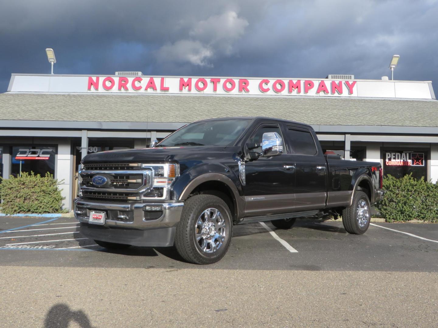 2020 BLACK /BROWN Ford F-350 SD King Ranch Crew Cab Long Bed 4WD (1FT8W3BT7LE) with an 6.7L V8 OHV 16V DIESEL engine, 6A transmission, located at 2630 Grass Valley Highway, Auburn, CA, 95603, (530) 508-5100, 38.937893, -121.095482 - Features a Decked Truck Bed storage system, Better Build toolbox, Bolt cable locks, Bug Defelector, and Weathertech side window deflectors.- Photo#0