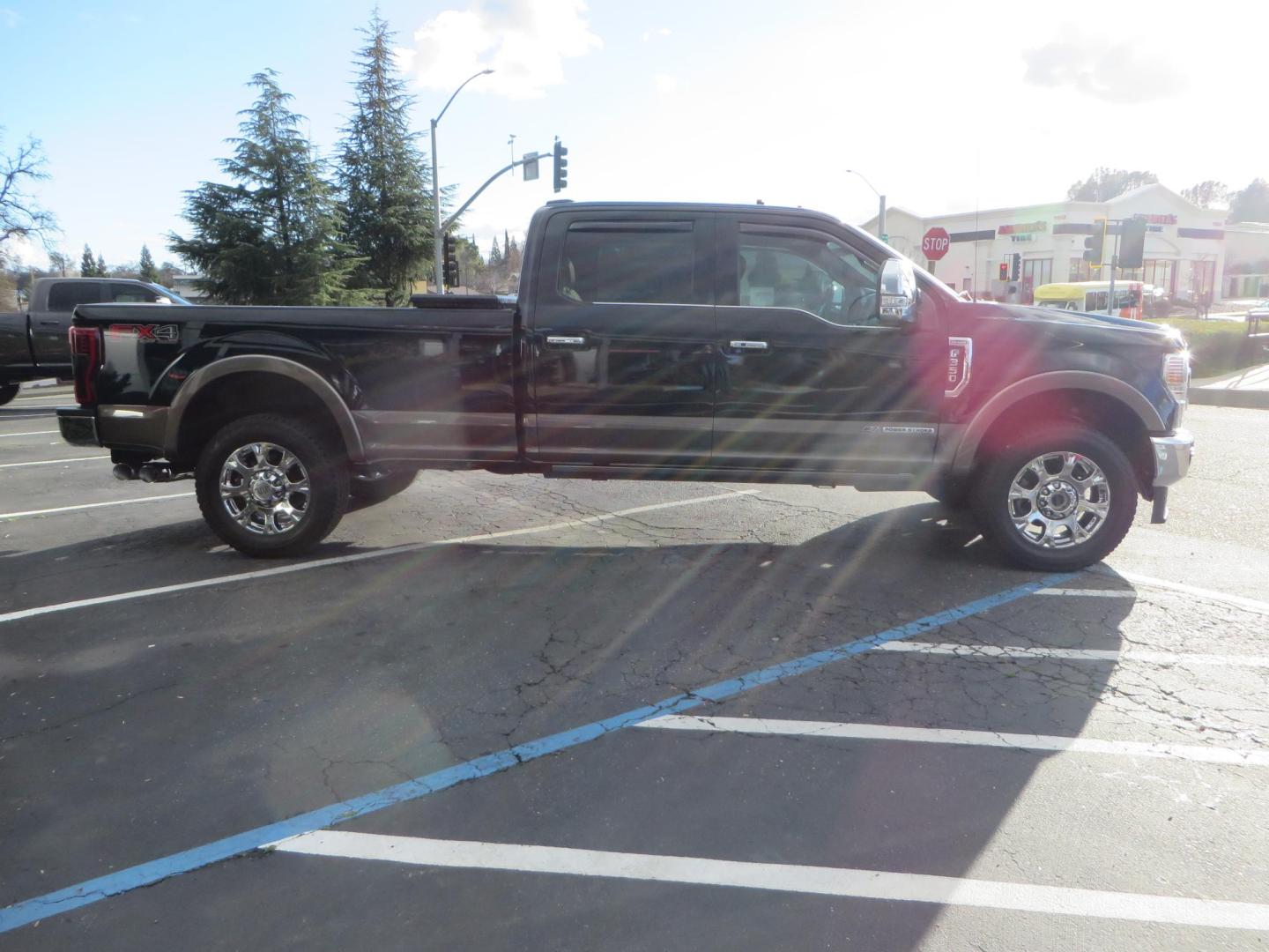 2020 BLACK /BROWN Ford F-350 SD King Ranch Crew Cab Long Bed 4WD (1FT8W3BT7LE) with an 6.7L V8 OHV 16V DIESEL engine, 6A transmission, located at 2630 Grass Valley Highway, Auburn, CA, 95603, (530) 508-5100, 38.937893, -121.095482 - Features a Decked Truck Bed storage system, Better Build toolbox, Bolt cable locks, Bug Defelector, and Weathertech side window deflectors.- Photo#4