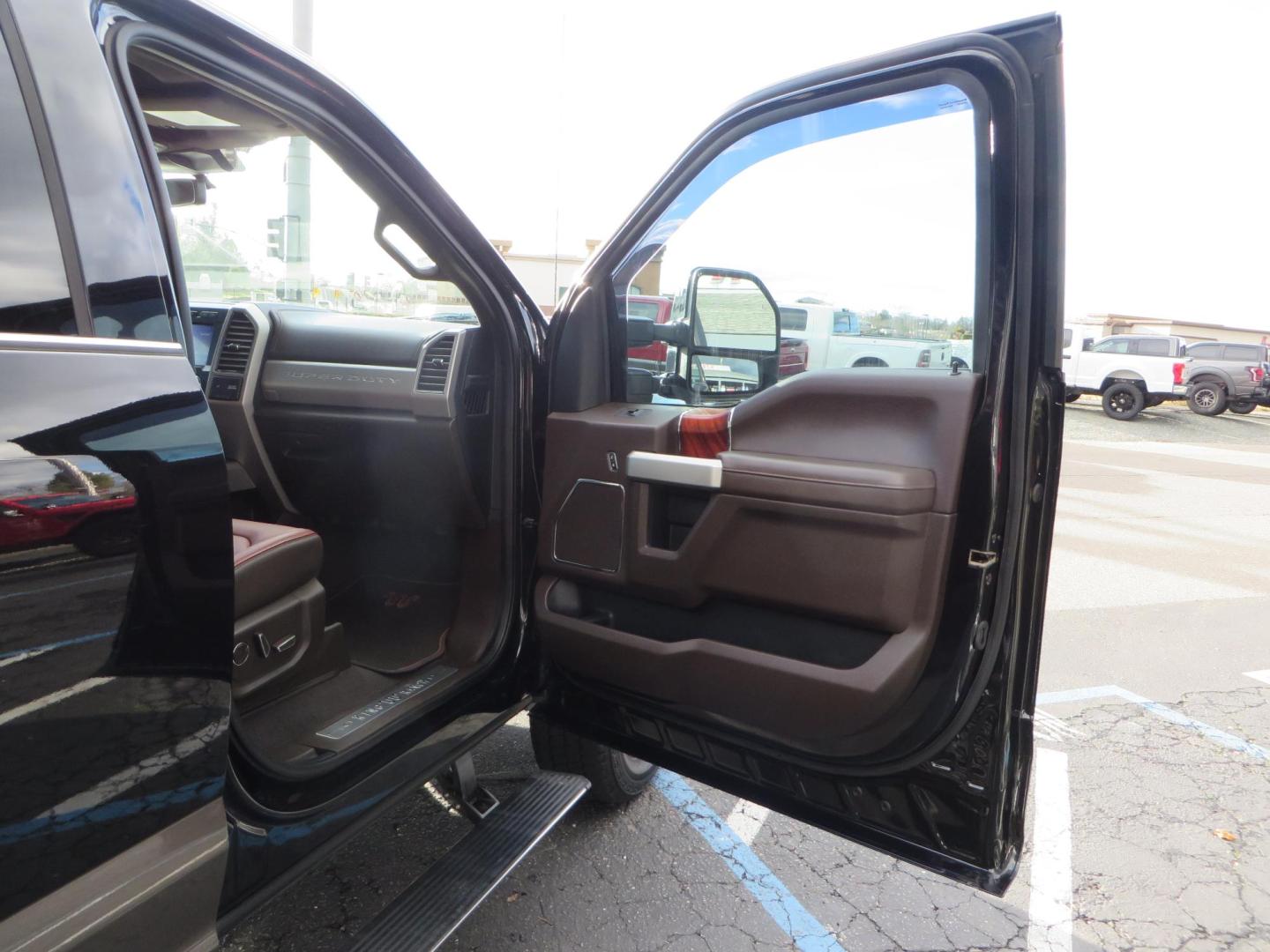 2020 BLACK /BROWN Ford F-350 SD King Ranch Crew Cab Long Bed 4WD (1FT8W3BT7LE) with an 6.7L V8 OHV 16V DIESEL engine, 6A transmission, located at 2630 Grass Valley Highway, Auburn, CA, 95603, (530) 508-5100, 38.937893, -121.095482 - Features a Decked Truck Bed storage system, Better Build toolbox, Bolt cable locks, Bug Defelector, and Weathertech side window deflectors.- Photo#56