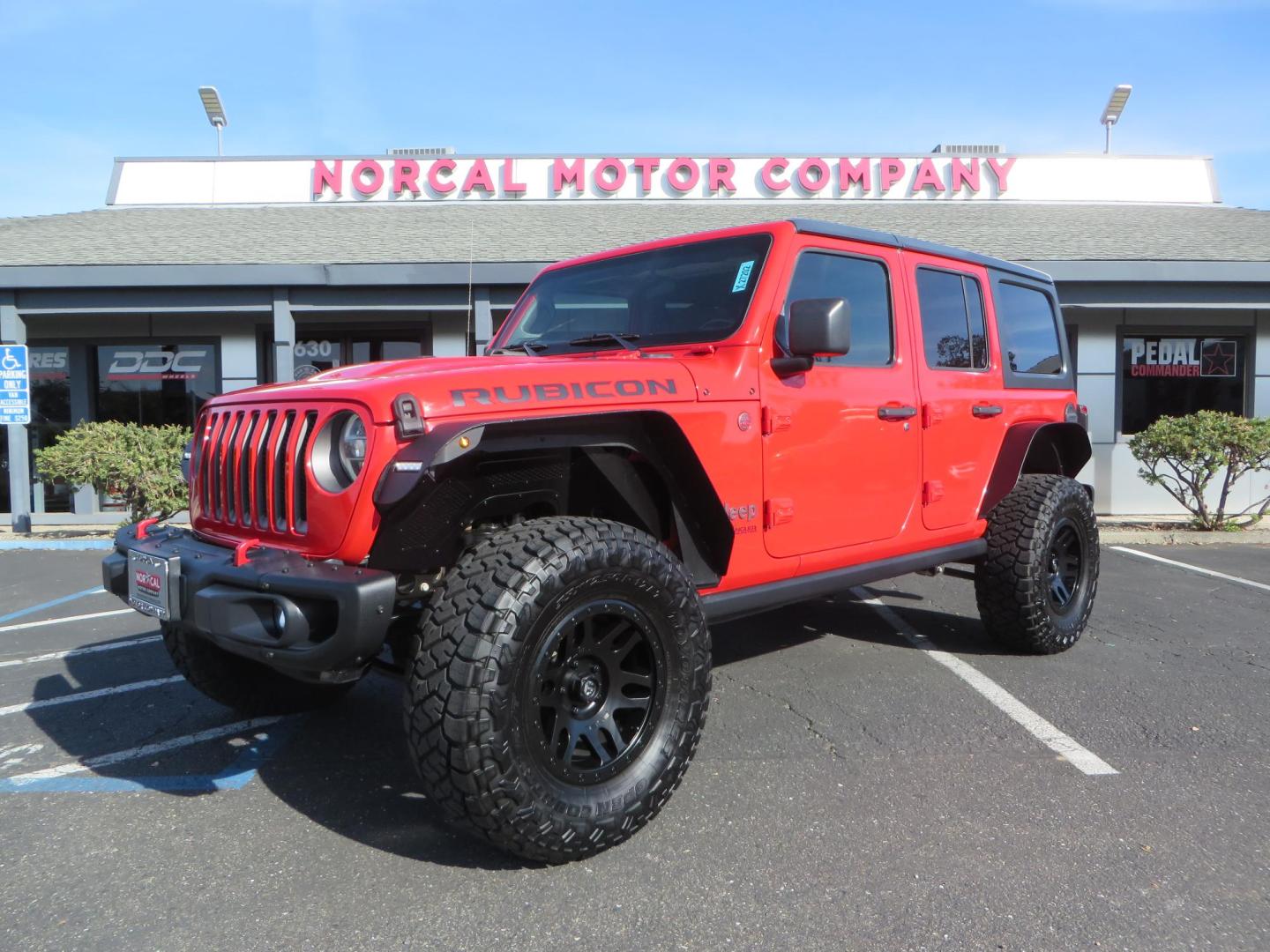 2020 Red /BLACK Jeep Wrangler Unlimited Rubicon (1C4HJXFN8LW) with an 2.0L L4 DOHC 16V TURBO engine, 6A transmission, located at 2630 Grass Valley Highway, Auburn, CA, 95603, (530) 508-5100, 38.937893, -121.095482 - Features - 17'' Fuel Recoil wheels, 35'' Nitto Ridge Grappler tires, Smittybilt XRC Flat fenders, Smittybilt inner fender liners, and new Alea Leather. - Photo#0