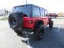 2020 Red /BLACK Jeep Wrangler Unlimited Rubicon (1C4HJXFN8LW) with an 2.0L L4 DOHC 16V TURBO engine, 6A transmission, located at 2630 Grass Valley Highway, Auburn, CA, 95603, (530) 508-5100, 38.937893, -121.095482 - Features - 17'' Fuel Recoil wheels, 35'' Nitto Ridge Grappler tires, Smittybilt XRC Flat fenders, Smittybilt inner fender liners, and new Alea Leather. - Photo#4
