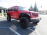 2020 Red /BLACK Jeep Wrangler Unlimited Rubicon (1C4HJXFN8LW) with an 2.0L L4 DOHC 16V TURBO engine, 6A transmission, located at 2630 Grass Valley Highway, Auburn, CA, 95603, (530) 508-5100, 38.937893, -121.095482 - Features - 17'' Fuel Recoil wheels, 35'' Nitto Ridge Grappler tires, Smittybilt XRC Flat fenders, Smittybilt inner fender liners, and new Alea Leather. - Photo#6