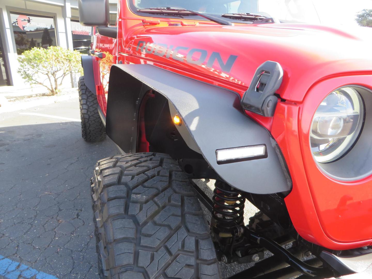 2020 Red /BLACK Jeep Wrangler Unlimited Rubicon (1C4HJXFN8LW) with an 2.0L L4 DOHC 16V TURBO engine, 6A transmission, located at 2630 Grass Valley Highway, Auburn, CA, 95603, (530) 508-5100, 38.937893, -121.095482 - Features - 17'' Fuel Recoil wheels, 35'' Nitto Ridge Grappler tires, Smittybilt XRC Flat fenders, Smittybilt inner fender liners, and new Alea Leather. - Photo#10