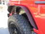 2020 Red /BLACK Jeep Wrangler Unlimited Rubicon (1C4HJXFN8LW) with an 2.0L L4 DOHC 16V TURBO engine, 6A transmission, located at 2630 Grass Valley Highway, Auburn, CA, 95603, (530) 508-5100, 38.937893, -121.095482 - Features - 17'' Fuel Recoil wheels, 35'' Nitto Ridge Grappler tires, Smittybilt XRC Flat fenders, Smittybilt inner fender liners, and new Alea Leather. - Photo#12