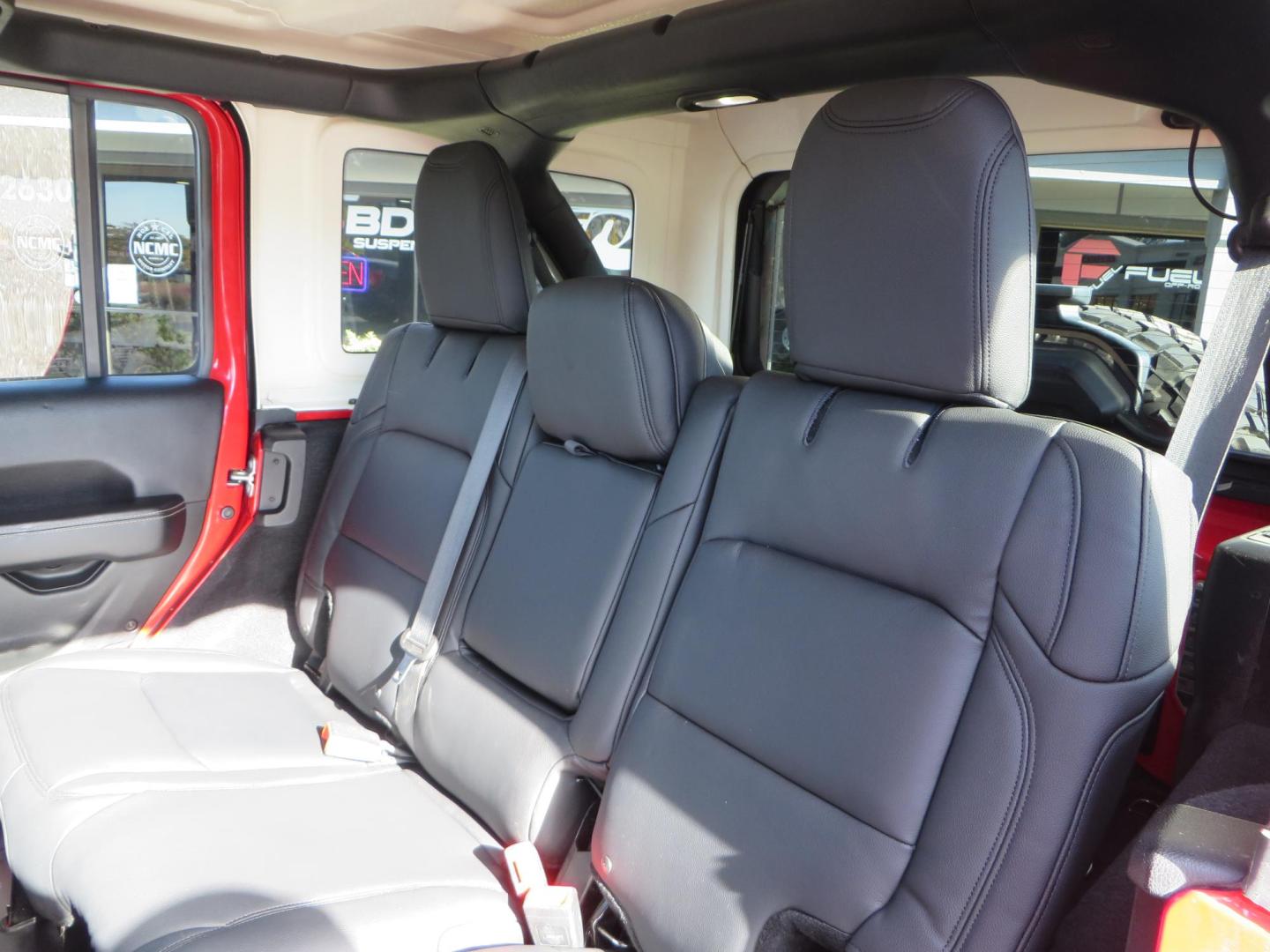 2020 Red /BLACK Jeep Wrangler Unlimited Rubicon (1C4HJXFN8LW) with an 2.0L L4 DOHC 16V TURBO engine, 6A transmission, located at 2630 Grass Valley Highway, Auburn, CA, 95603, (530) 508-5100, 38.937893, -121.095482 - Features - 17'' Fuel Recoil wheels, 35'' Nitto Ridge Grappler tires, Smittybilt XRC Flat fenders, Smittybilt inner fender liners, and new Alea Leather. - Photo#41