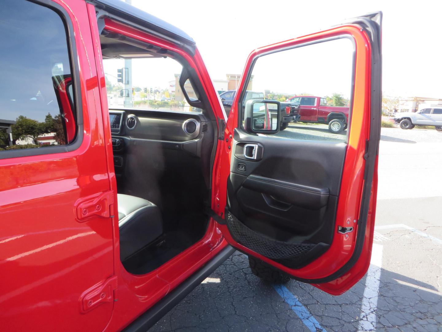 2020 Red /BLACK Jeep Wrangler Unlimited Rubicon (1C4HJXFN8LW) with an 2.0L L4 DOHC 16V TURBO engine, 6A transmission, located at 2630 Grass Valley Highway, Auburn, CA, 95603, (530) 508-5100, 38.937893, -121.095482 - Features - 17'' Fuel Recoil wheels, 35'' Nitto Ridge Grappler tires, Smittybilt XRC Flat fenders, Smittybilt inner fender liners, and new Alea Leather. - Photo#46