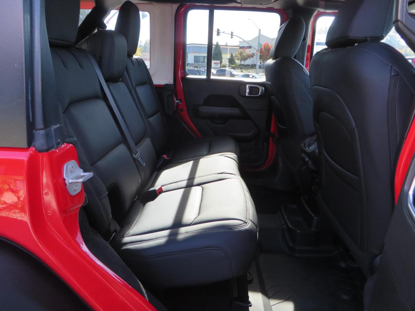 2020 Red /BLACK Jeep Wrangler Unlimited Rubicon (1C4HJXFN8LW) with an 2.0L L4 DOHC 16V TURBO engine, 6A transmission, located at 2630 Grass Valley Highway, Auburn, CA, 95603, (530) 508-5100, 38.937893, -121.095482 - Features - 17'' Fuel Recoil wheels, 35'' Nitto Ridge Grappler tires, Smittybilt XRC Flat fenders, Smittybilt inner fender liners, and new Alea Leather. - Photo#54
