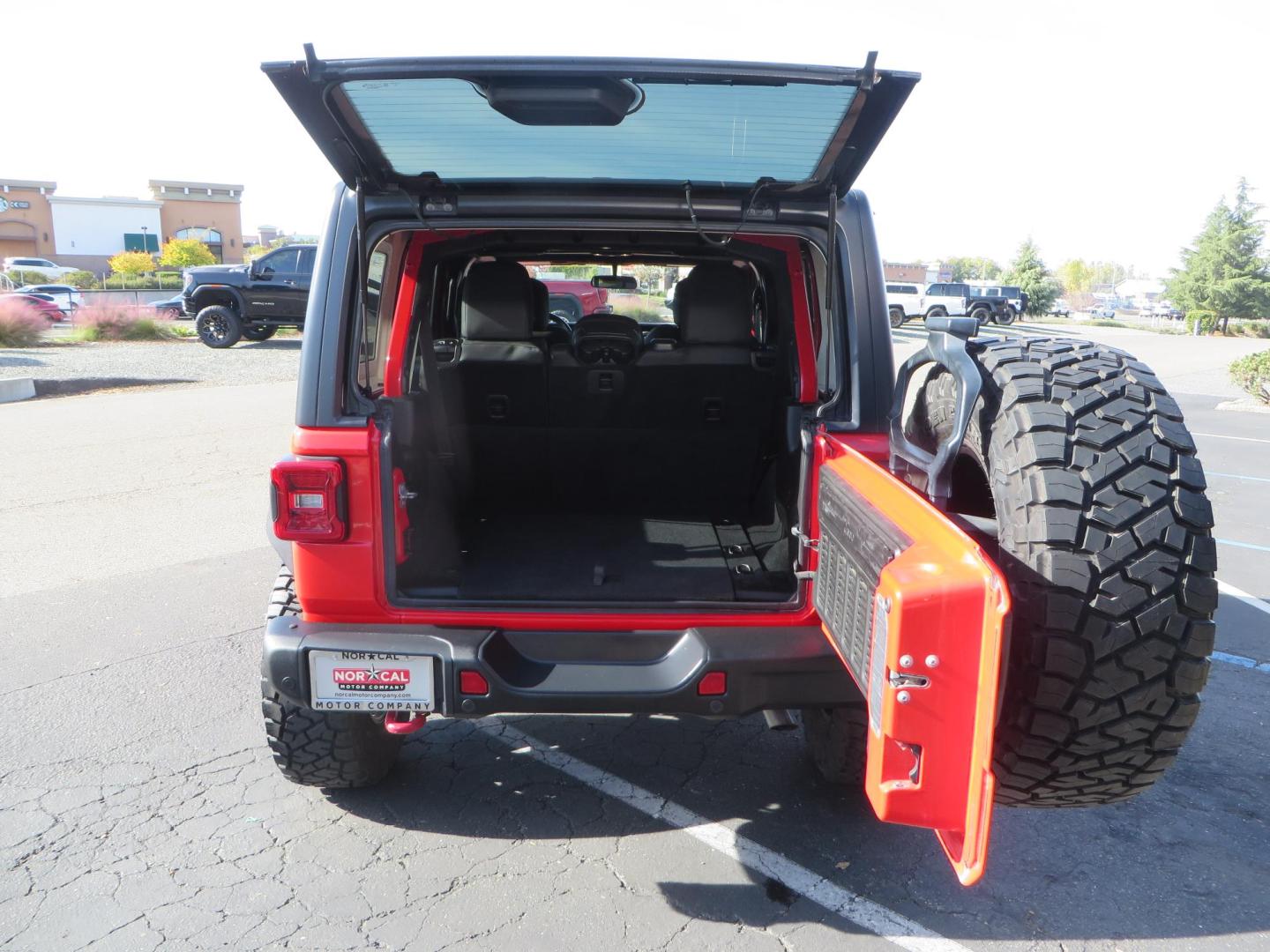 2020 Red /BLACK Jeep Wrangler Unlimited Rubicon (1C4HJXFN8LW) with an 2.0L L4 DOHC 16V TURBO engine, 6A transmission, located at 2630 Grass Valley Highway, Auburn, CA, 95603, (530) 508-5100, 38.937893, -121.095482 - Features - 17'' Fuel Recoil wheels, 35'' Nitto Ridge Grappler tires, Smittybilt XRC Flat fenders, Smittybilt inner fender liners, and new Alea Leather. - Photo#58