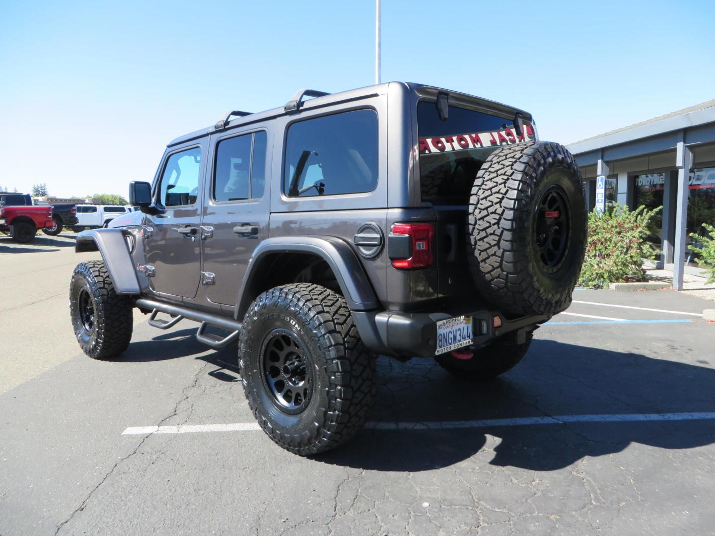 2020 Gray Jeep Wrangler Unlimited Rubicon (1C4HJXFN0LW) with an 2.0L L4 DOHC 16V TURBO engine, 6A transmission, located at 2630 Grass Valley Highway, Auburn, CA, 95603, (530) 508-5100, 38.937893, -121.095482 - Features a 3" Zone offroad suspension system, Fox Adventure series shocks, 37" Toyo RT tires, 17" Double Black Method NV wheels, Teraflex HD spare tire carrier, Nerf steps, and roof rack crossbars. - Photo#2