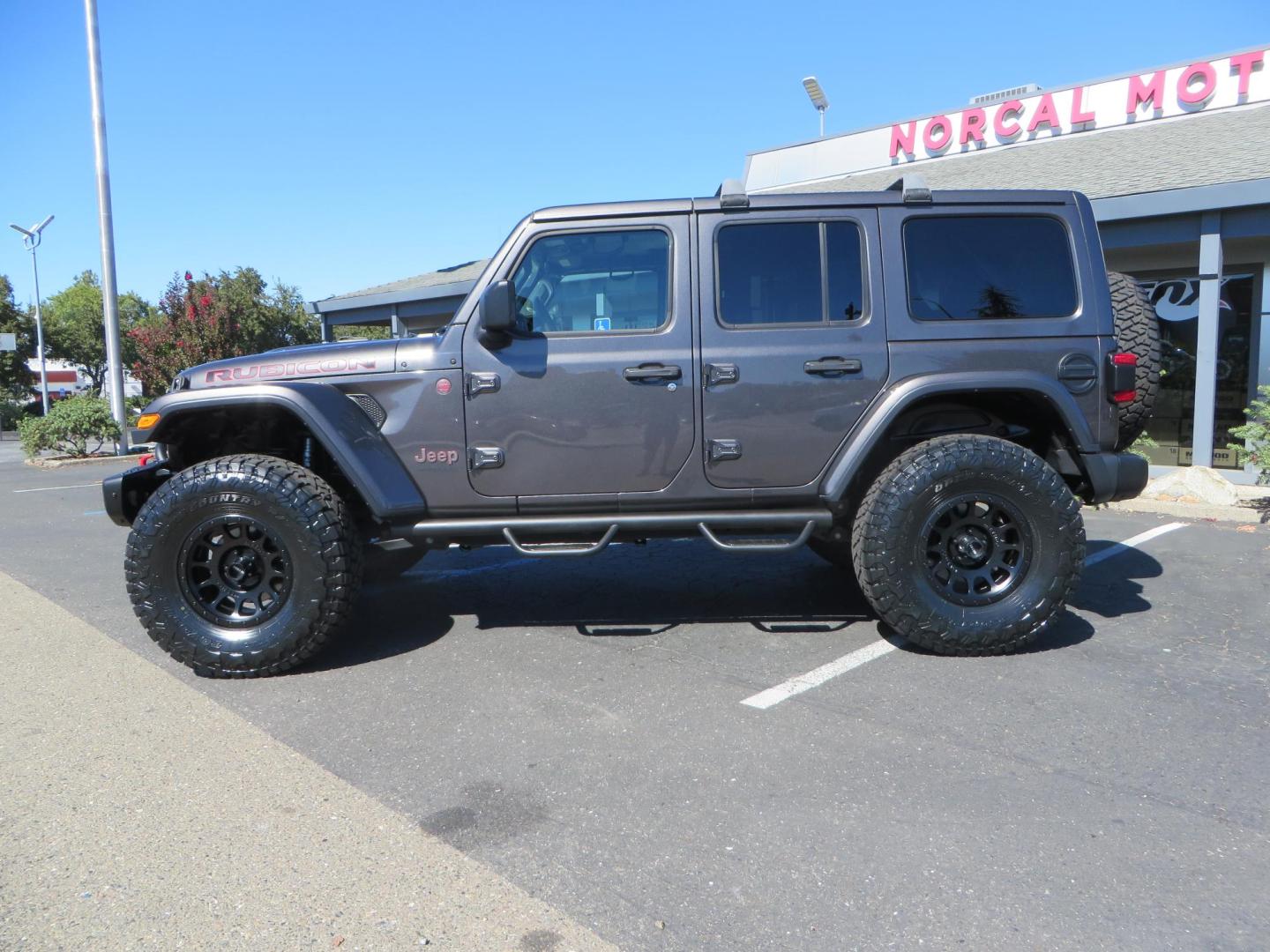 2020 Gray Jeep Wrangler Unlimited Rubicon (1C4HJXFN0LW) with an 2.0L L4 DOHC 16V TURBO engine, 6A transmission, located at 2630 Grass Valley Highway, Auburn, CA, 95603, (530) 508-5100, 38.937893, -121.095482 - Features a 3" Zone offroad suspension system, Fox Adventure series shocks, 37" Toyo RT tires, 17" Double Black Method NV wheels, Teraflex HD spare tire carrier, Nerf steps, and roof rack crossbars. - Photo#1