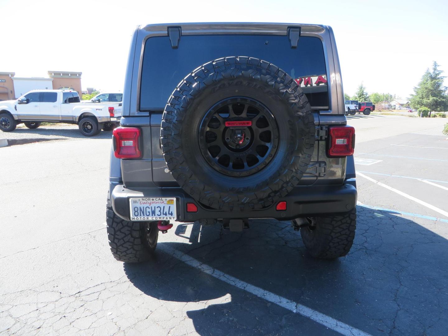 2020 Gray Jeep Wrangler Unlimited Rubicon (1C4HJXFN0LW) with an 2.0L L4 DOHC 16V TURBO engine, 6A transmission, located at 2630 Grass Valley Highway, Auburn, CA, 95603, (530) 508-5100, 38.937893, -121.095482 - Features a 3" Zone offroad suspension system, Fox Adventure series shocks, 37" Toyo RT tires, 17" Double Black Method NV wheels, Teraflex HD spare tire carrier, Nerf steps, and roof rack crossbars. - Photo#3