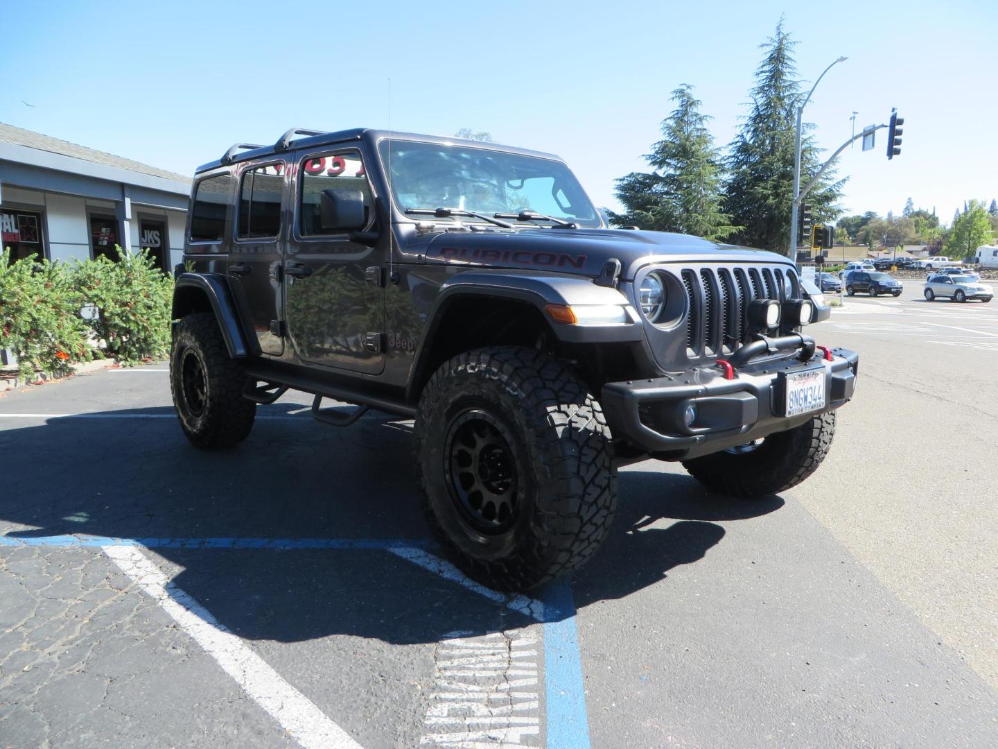 2020 Gray Jeep Wrangler Unlimited Rubicon (1C4HJXFN0LW) with an 2.0L L4 DOHC 16V TURBO engine, 6A transmission, located at 2630 Grass Valley Highway, Auburn, CA, 95603, (530) 508-5100, 38.937893, -121.095482 - Features a 3" Zone offroad suspension system, Fox Adventure series shocks, 37" Toyo RT tires, 17" Double Black Method NV wheels, Teraflex HD spare tire carrier, Nerf steps, and roof rack crossbars. - Photo#6