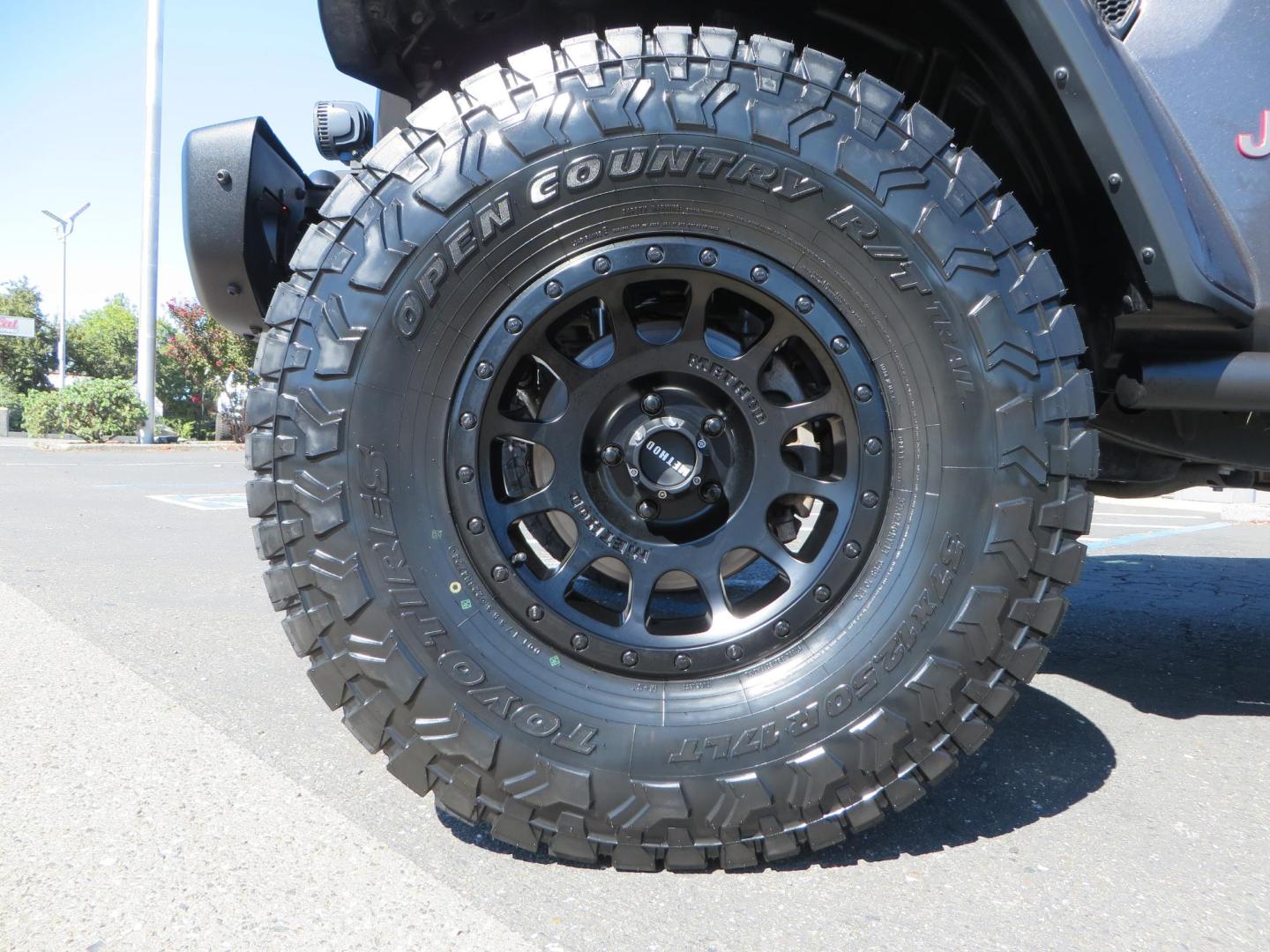 2020 Gray Jeep Wrangler Unlimited Rubicon (1C4HJXFN0LW) with an 2.0L L4 DOHC 16V TURBO engine, 6A transmission, located at 2630 Grass Valley Highway, Auburn, CA, 95603, (530) 508-5100, 38.937893, -121.095482 - Features a 3" Zone offroad suspension system, Fox Adventure series shocks, 37" Toyo RT tires, 17" Double Black Method NV wheels, Teraflex HD spare tire carrier, Nerf steps, and roof rack crossbars. - Photo#8