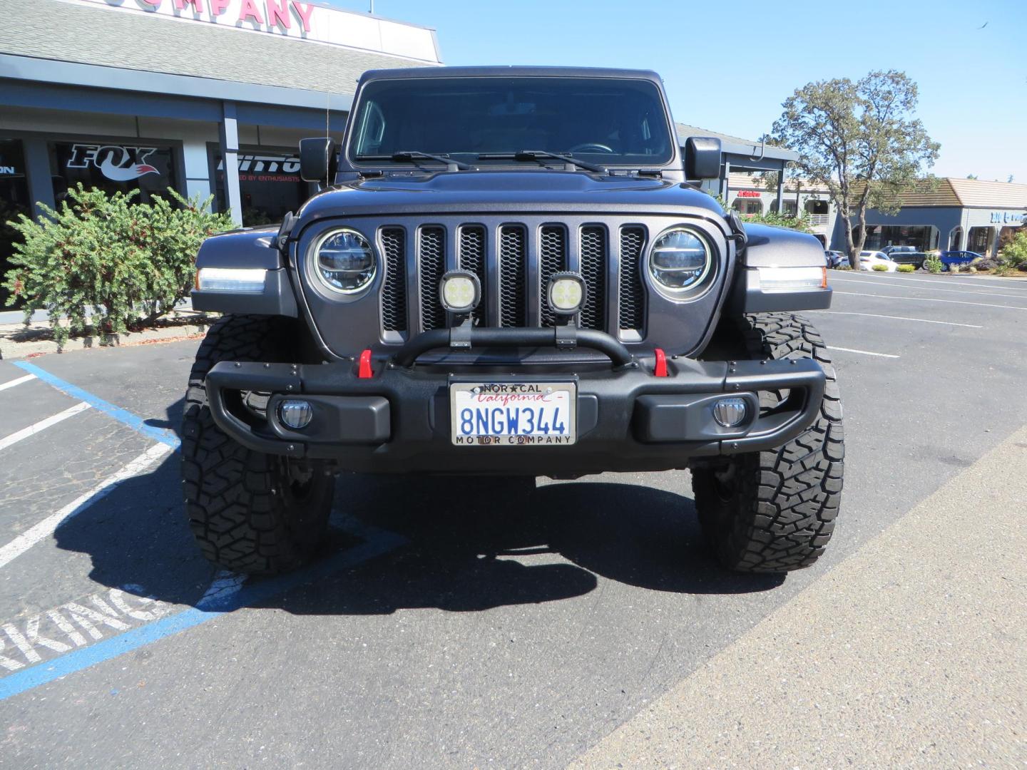 2020 Gray Jeep Wrangler Unlimited Rubicon (1C4HJXFN0LW) with an 2.0L L4 DOHC 16V TURBO engine, 6A transmission, located at 2630 Grass Valley Highway, Auburn, CA, 95603, (530) 508-5100, 38.937893, -121.095482 - Features a 3" Zone offroad suspension system, Fox Adventure series shocks, 37" Toyo RT tires, 17" Double Black Method NV wheels, Teraflex HD spare tire carrier, Nerf steps, and roof rack crossbars. - Photo#7