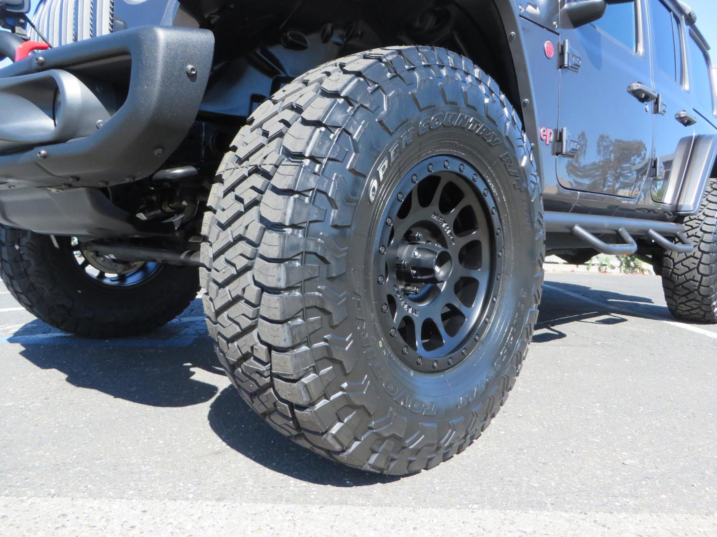 2020 Gray Jeep Wrangler Unlimited Rubicon (1C4HJXFN0LW) with an 2.0L L4 DOHC 16V TURBO engine, 6A transmission, located at 2630 Grass Valley Highway, Auburn, CA, 95603, (530) 508-5100, 38.937893, -121.095482 - Features a 3" Zone offroad suspension system, Fox Adventure series shocks, 37" Toyo RT tires, 17" Double Black Method NV wheels, Teraflex HD spare tire carrier, Nerf steps, and roof rack crossbars. - Photo#9