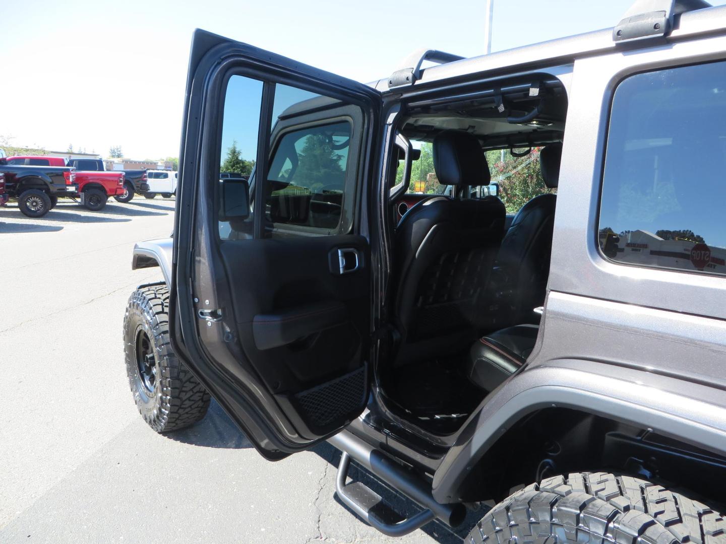 2020 Gray Jeep Wrangler Unlimited Rubicon (1C4HJXFN0LW) with an 2.0L L4 DOHC 16V TURBO engine, 6A transmission, located at 2630 Grass Valley Highway, Auburn, CA, 95603, (530) 508-5100, 38.937893, -121.095482 - Features a 3" Zone offroad suspension system, Fox Adventure series shocks, 37" Toyo RT tires, 17" Double Black Method NV wheels, Teraflex HD spare tire carrier, Nerf steps, and roof rack crossbars. - Photo#41