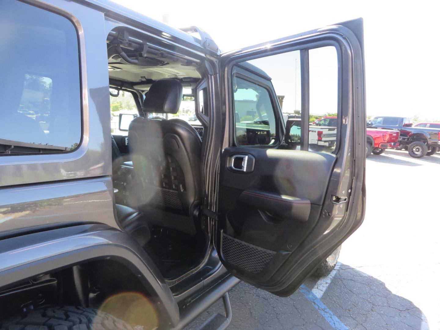 2020 Gray Jeep Wrangler Unlimited Rubicon (1C4HJXFN0LW) with an 2.0L L4 DOHC 16V TURBO engine, 6A transmission, located at 2630 Grass Valley Highway, Auburn, CA, 95603, (530) 508-5100, 38.937893, -121.095482 - Features a 3" Zone offroad suspension system, Fox Adventure series shocks, 37" Toyo RT tires, 17" Double Black Method NV wheels, Teraflex HD spare tire carrier, Nerf steps, and roof rack crossbars. - Photo#57
