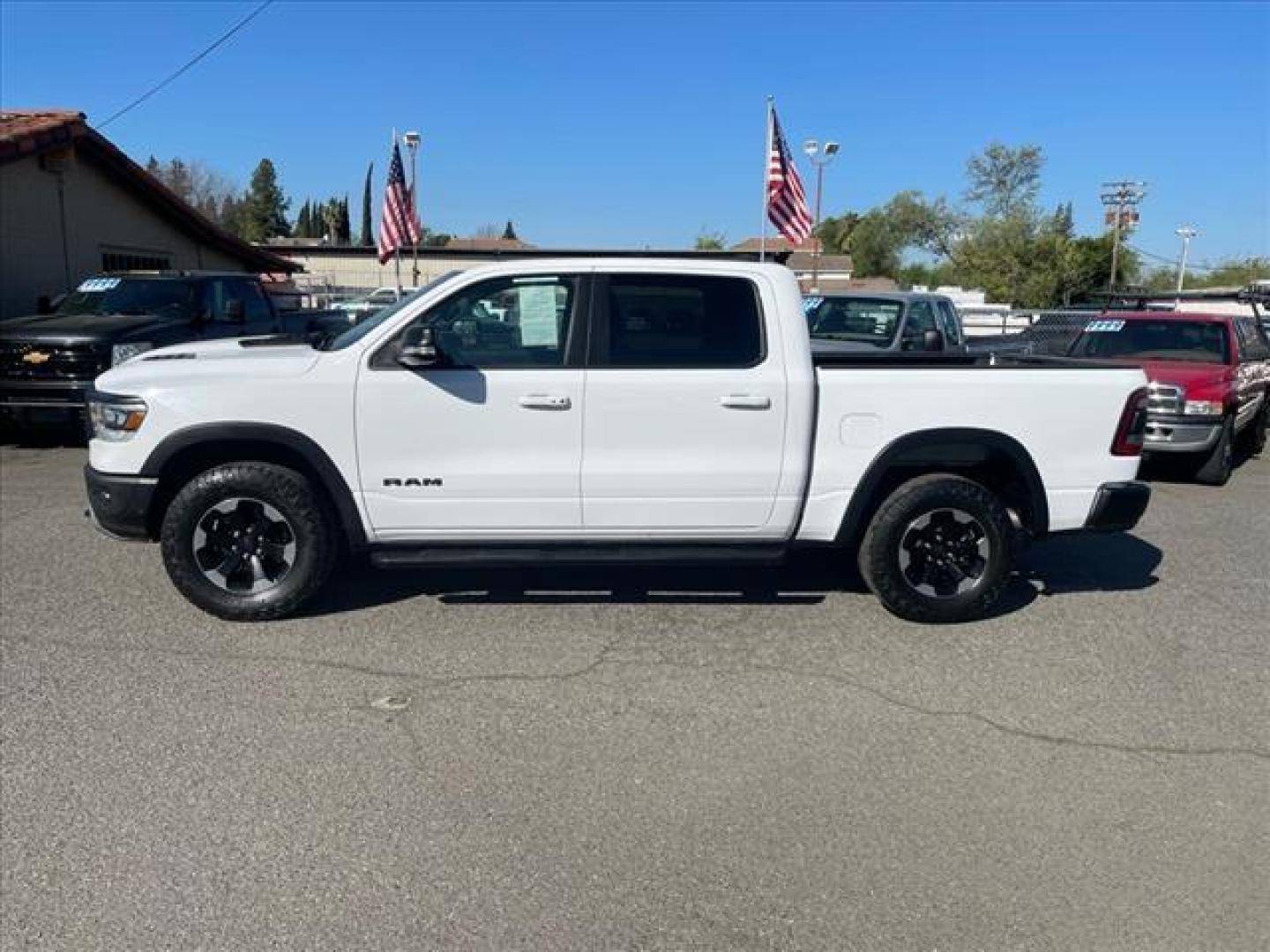 2020 Bright White Clear Coat RAM 1500 Rebel (1C6SRFLT3LN) with an 5.7L HEMI 5.7L V8 395hp 410ft. lbs. Sequential Multiport Fuel Injection engine, 8-Speed Shiftable Automatic transmission, located at 800 Riverside Ave, Roseville, CA, 95678, 916-773-4549 & Toll Free: 866-719-4393, 38.732265, -121.291039 - 5.7 HEMI CREW CAB 4X4 REBEL CLEAN CARFAX - Photo#1