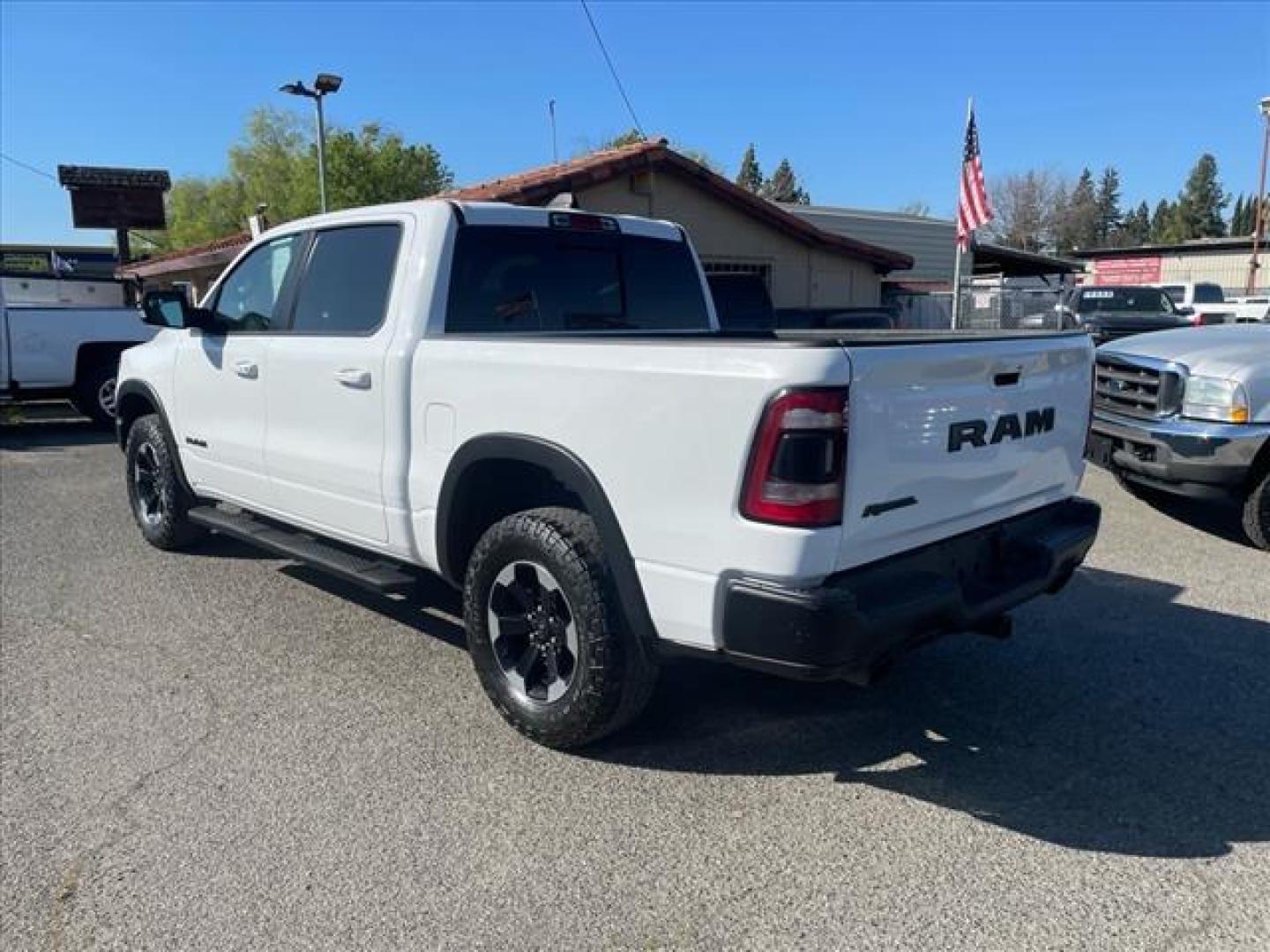 2020 Bright White Clear Coat RAM 1500 Rebel (1C6SRFLT3LN) with an 5.7L HEMI 5.7L V8 395hp 410ft. lbs. Sequential Multiport Fuel Injection engine, 8-Speed Shiftable Automatic transmission, located at 800 Riverside Ave, Roseville, CA, 95678, 916-773-4549 & Toll Free: 866-719-4393, 38.732265, -121.291039 - 5.7 HEMI CREW CAB 4X4 REBEL CLEAN CARFAX - Photo#2