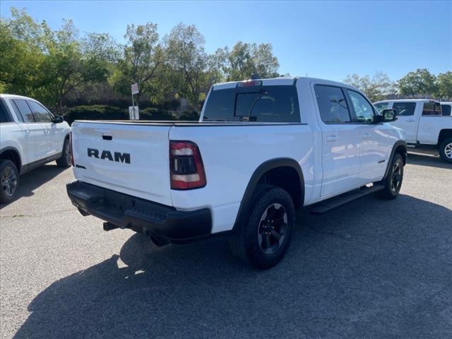 2020 Bright White Clear Coat RAM 1500 Rebel (1C6SRFLT3LN) with an 5.7L HEMI 5.7L V8 395hp 410ft. lbs. Sequential Multiport Fuel Injection engine, 8-Speed Shiftable Automatic transmission, located at 800 Riverside Ave, Roseville, CA, 95678, 916-773-4549 & Toll Free: 866-719-4393, 38.732265, -121.291039 - 5.7 HEMI CREW CAB 4X4 REBEL CLEAN CARFAX - Photo#4