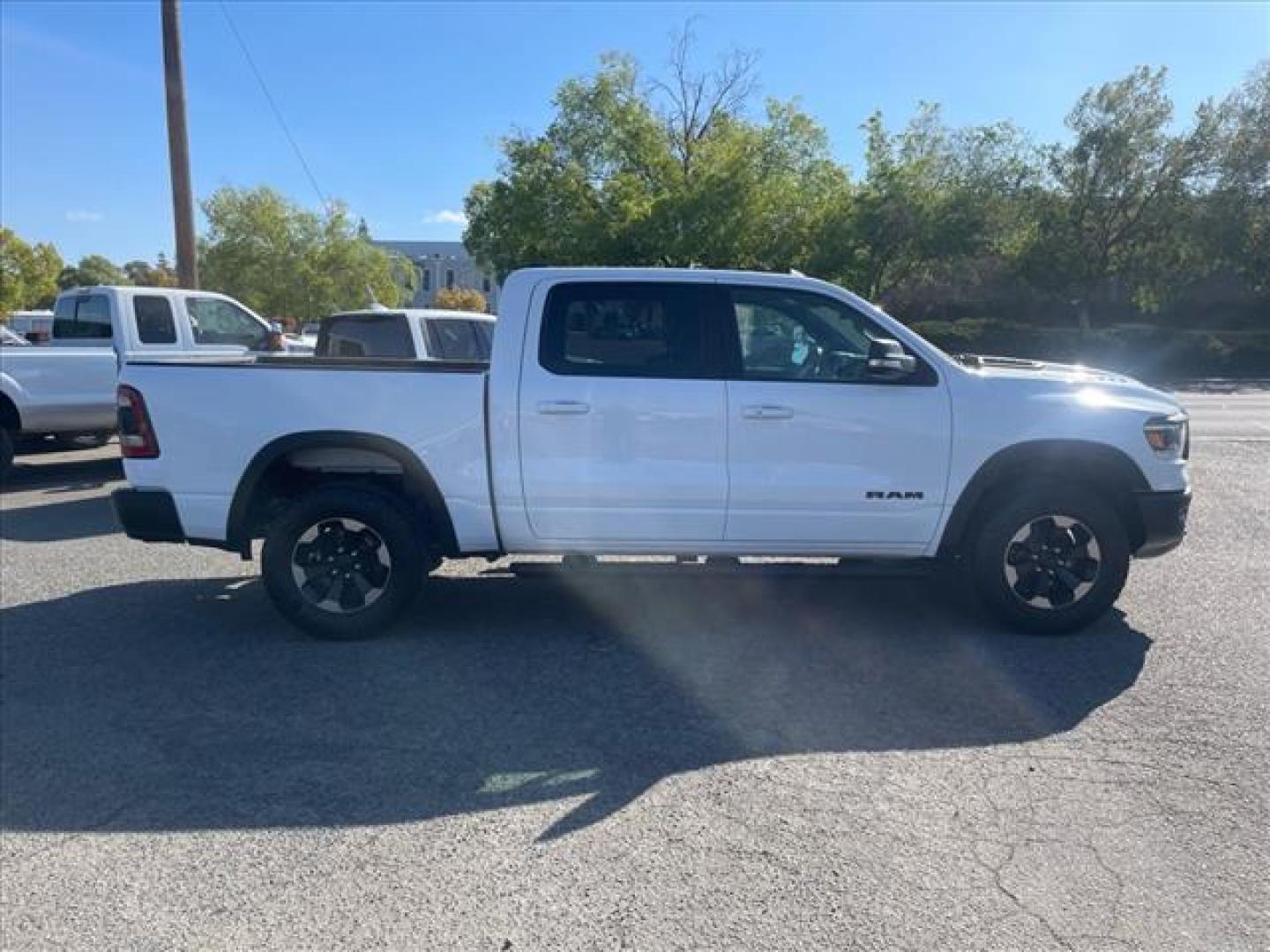2020 Bright White Clear Coat RAM 1500 Rebel (1C6SRFLT3LN) with an 5.7L HEMI 5.7L V8 395hp 410ft. lbs. Sequential Multiport Fuel Injection engine, 8-Speed Shiftable Automatic transmission, located at 800 Riverside Ave, Roseville, CA, 95678, 916-773-4549 & Toll Free: 866-719-4393, 38.732265, -121.291039 - 5.7 HEMI CREW CAB 4X4 REBEL CLEAN CARFAX - Photo#5