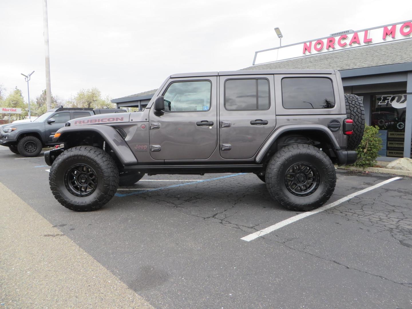 2021 CHARCOAL /black Jeep Wrangler Unlimited Rubicon (1C4HJXFG5MW) with an 3.6L V6 DOHC 24V FFV engine, 6A transmission, located at 2630 Grass Valley Highway, Auburn, CA, 95603, (530) 508-5100, 38.937893, -121.095482- Photo#7