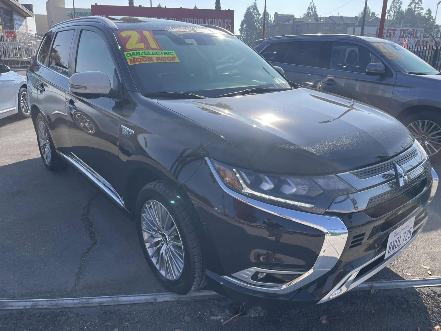 2021 RUBY BLACK Mitsubishi Outlander PHEV SEL (JA4J2VA72MZ) with an 2.0L L4 DOHC 16V HYBRID engine, 1A transmission, located at 744 E Miner Ave, Stockton, CA, 95202, (209) 944-5770, 37.956863, -121.282082 - PLUS TAXES AND FEES NO CHARGER AVAILABE SIN CARGADOR DISPONIBLE - Photo#0
