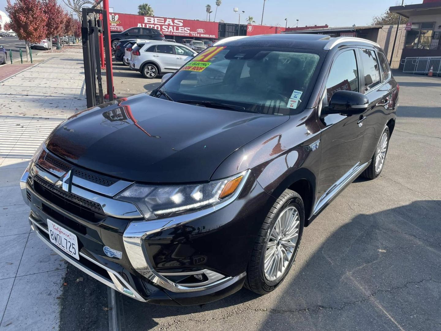 2021 RUBY BLACK Mitsubishi Outlander PHEV SEL (JA4J2VA72MZ) with an 2.0L L4 DOHC 16V HYBRID engine, 1A transmission, located at 744 E Miner Ave, Stockton, CA, 95202, (209) 944-5770, 37.956863, -121.282082 - PLUS TAXES AND FEES NO CHARGER AVAILABE SIN CARGADOR DISPONIBLE - Photo#2