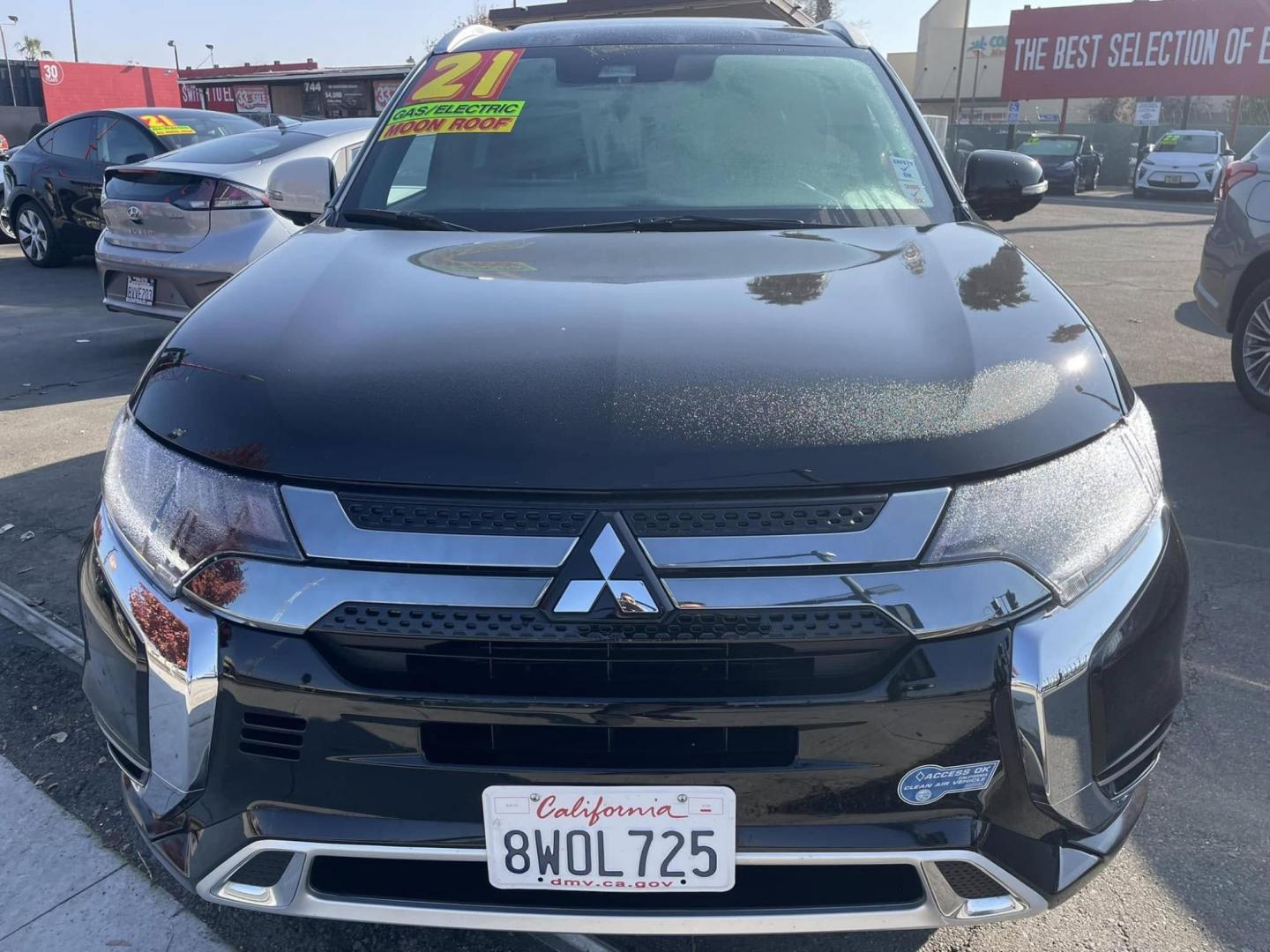 2021 RUBY BLACK Mitsubishi Outlander PHEV SEL (JA4J2VA72MZ) with an 2.0L L4 DOHC 16V HYBRID engine, 1A transmission, located at 744 E Miner Ave, Stockton, CA, 95202, (209) 944-5770, 37.956863, -121.282082 - PLUS TAXES AND FEES NO CHARGER AVAILABE SIN CARGADOR DISPONIBLE - Photo#1