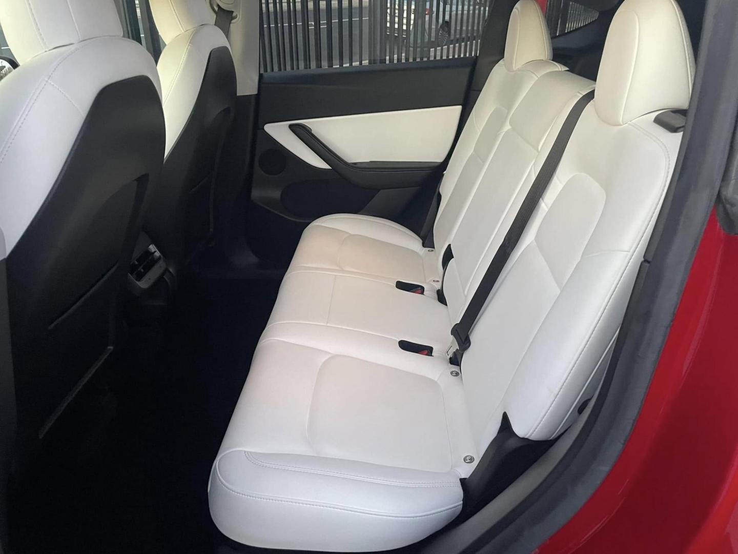 2021 RED /WHITE Tesla Model Y Long Range (5YJYGDEE9MF) with an ELECTRIC engine, 1A transmission, located at 744 E Miner Ave, Stockton, CA, 95202, (209) 944-5770, 37.956863, -121.282082 - PLUS TAXES AND FEES NO CHARGER AVAILABLE - Photo#10