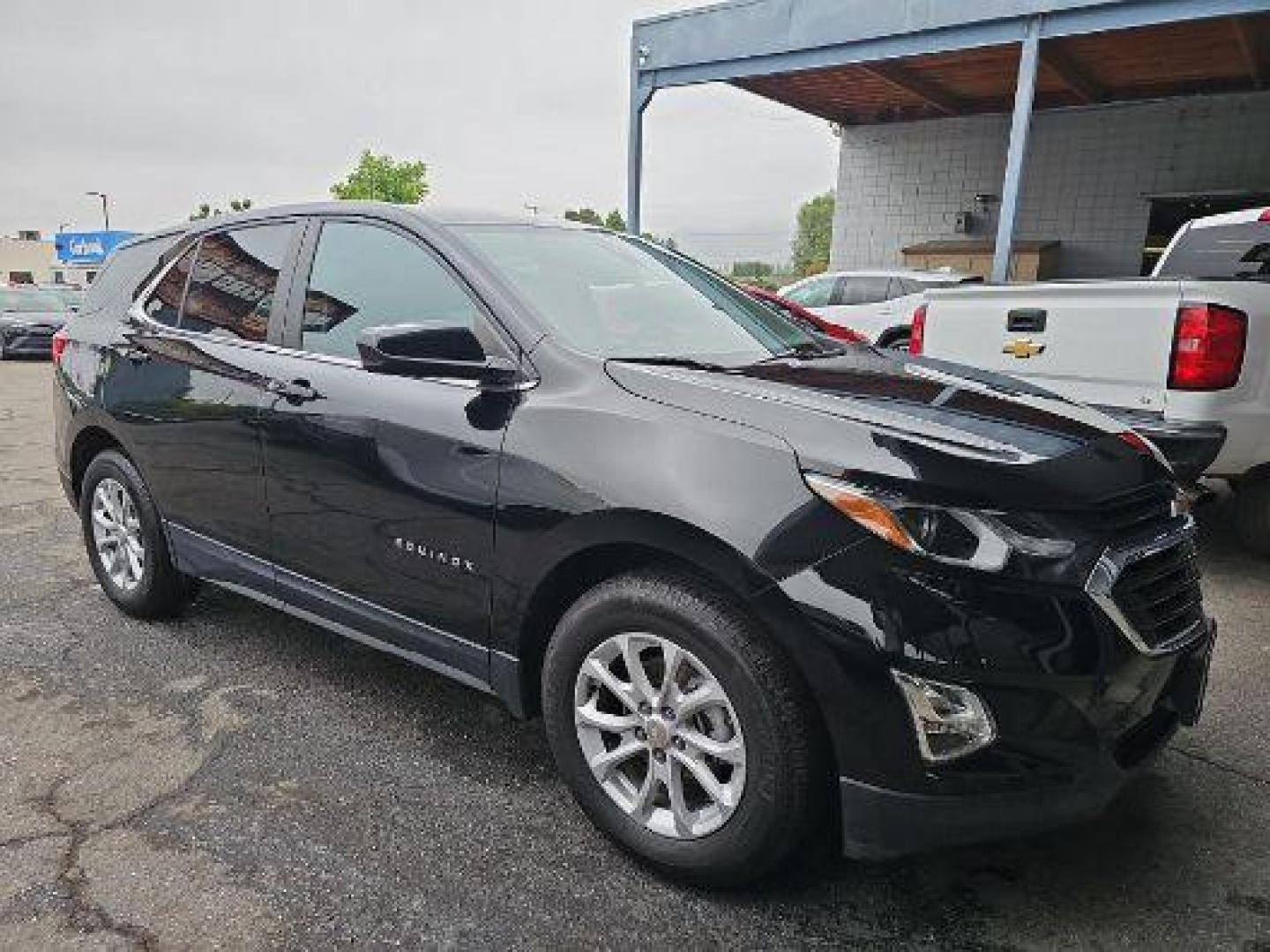 2021 BLACK Chevrolet Equinox (3GNAXJEV0ML) with an 4-Cyl Turbo 1.5 Liter engine, Automatic 6-Spd w/Overdrive transmission, located at 412 Auto Vista Drive, Palmdale, 93551, (661) 945-0620, 34.592636, -118.136681 - Photo#2
