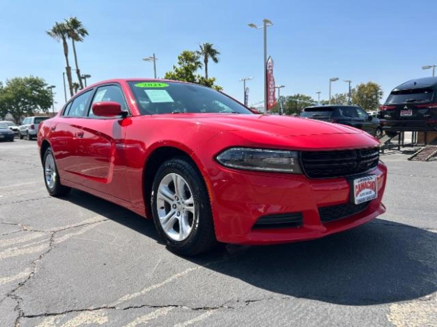 2021 RED Dodge Charger (2C3CDXBG2MH) with an V6 3.6 Liter engine, Automatic 8-Spd w/AutoStick transmission, located at 412 Auto Vista Drive, Palmdale, 93551, (661) 945-0620, 34.592636, -118.136681 - Photo#0