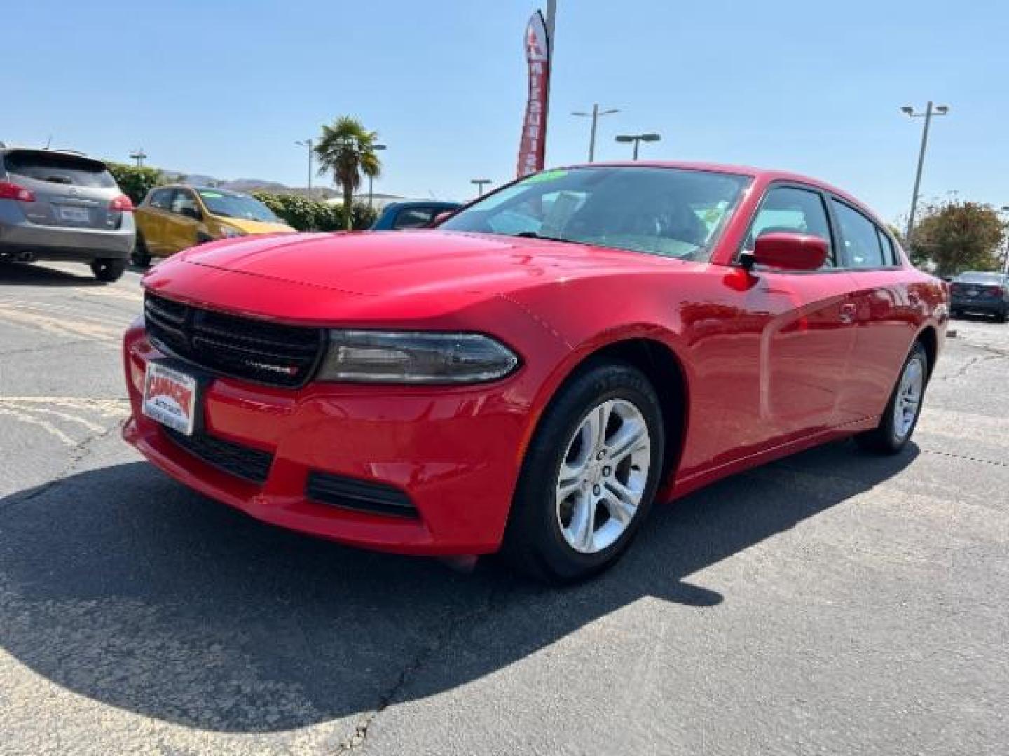 2021 RED Dodge Charger (2C3CDXBG2MH) with an V6 3.6 Liter engine, Automatic 8-Spd w/AutoStick transmission, located at 412 Auto Vista Drive, Palmdale, 93551, (661) 945-0620, 34.592636, -118.136681 - Photo#1