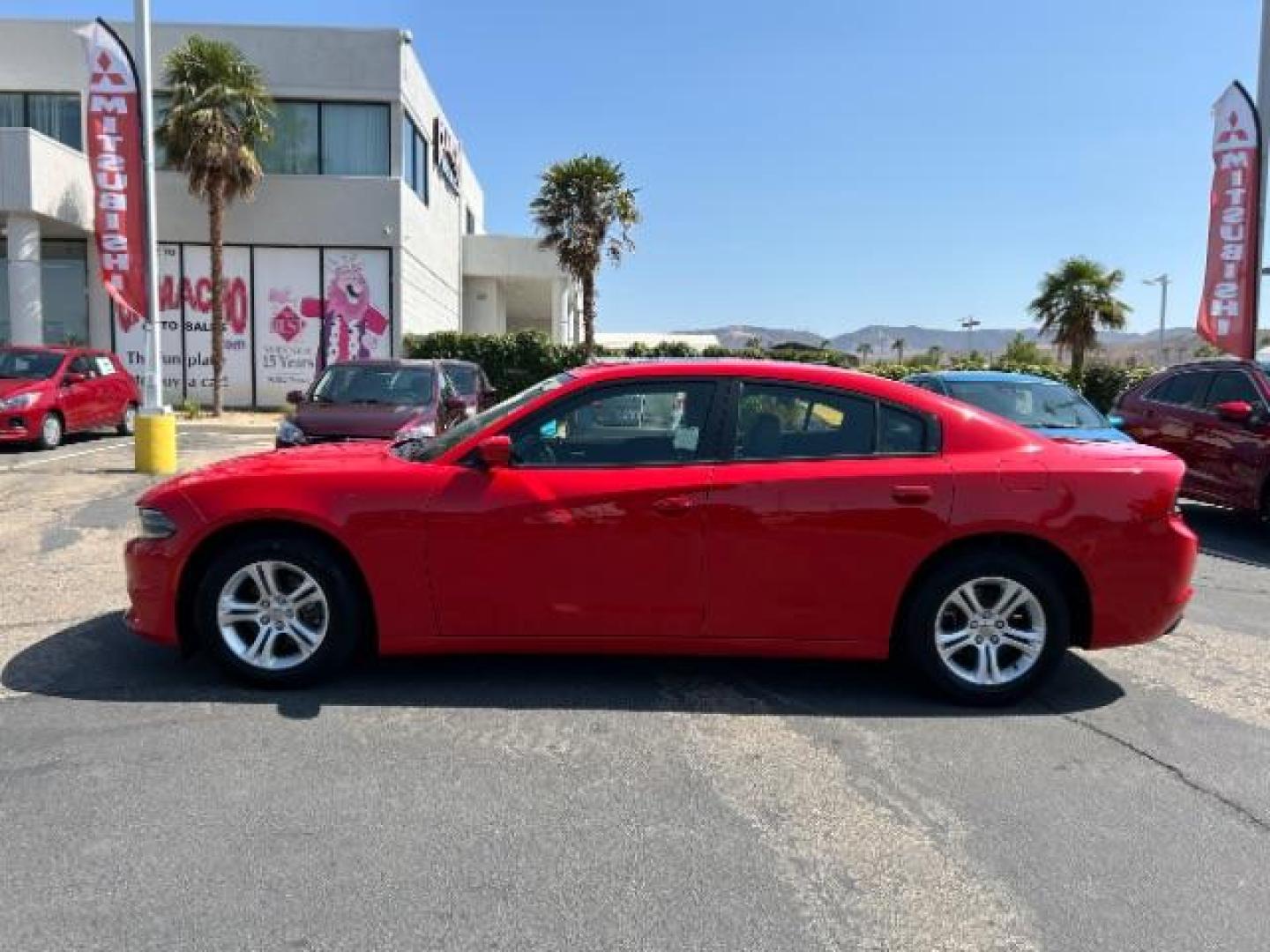 2021 RED Dodge Charger (2C3CDXBG2MH) with an V6 3.6 Liter engine, Automatic 8-Spd w/AutoStick transmission, located at 412 Auto Vista Drive, Palmdale, 93551, (661) 945-0620, 34.592636, -118.136681 - Photo#2