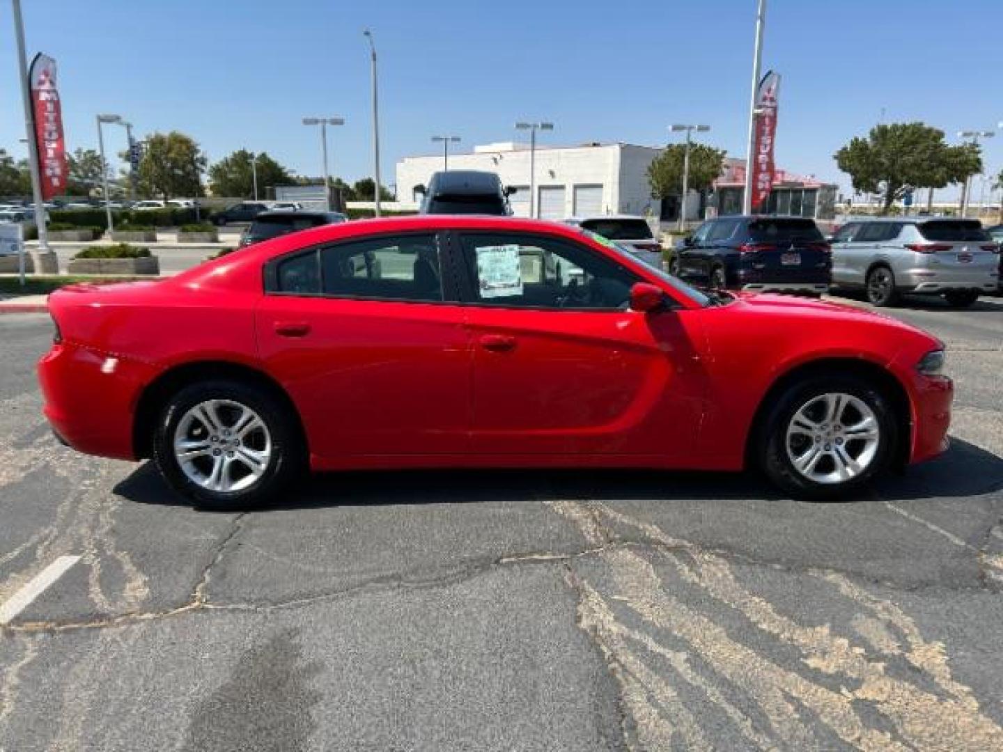 2021 RED Dodge Charger (2C3CDXBG2MH) with an V6 3.6 Liter engine, Automatic 8-Spd w/AutoStick transmission, located at 412 Auto Vista Drive, Palmdale, 93551, (661) 945-0620, 34.592636, -118.136681 - Photo#8