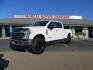 2021 White /BLACK Ford F-250 SD Lariat Crew Cab 4WD (1FT7W2BTXME) with an 6.7L V8 OHV 16V DIESEL engine, 6A transmission, located at 2630 Grass Valley Highway, Auburn, CA, 95603, (530) 508-5100, 38.937893, -121.095482 - Features a BDS level kit with Fox 2.0 shocks, 35" Toyo Open Country RT trail tires, 18" KMC IMS wheels, Weathertech Bug deflector and floor liners. - Photo#0